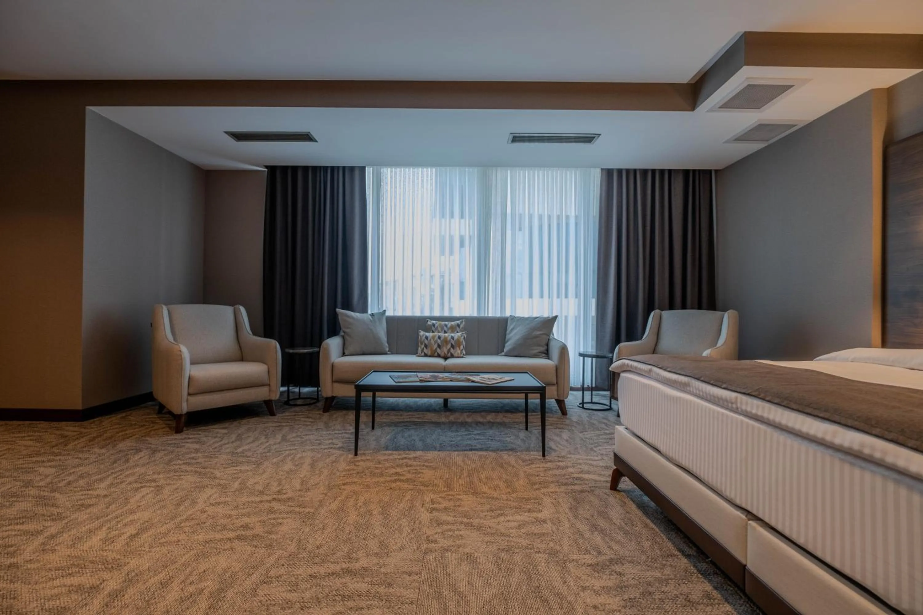 Seating area, Bed in B'İSTANBUL HOTEL