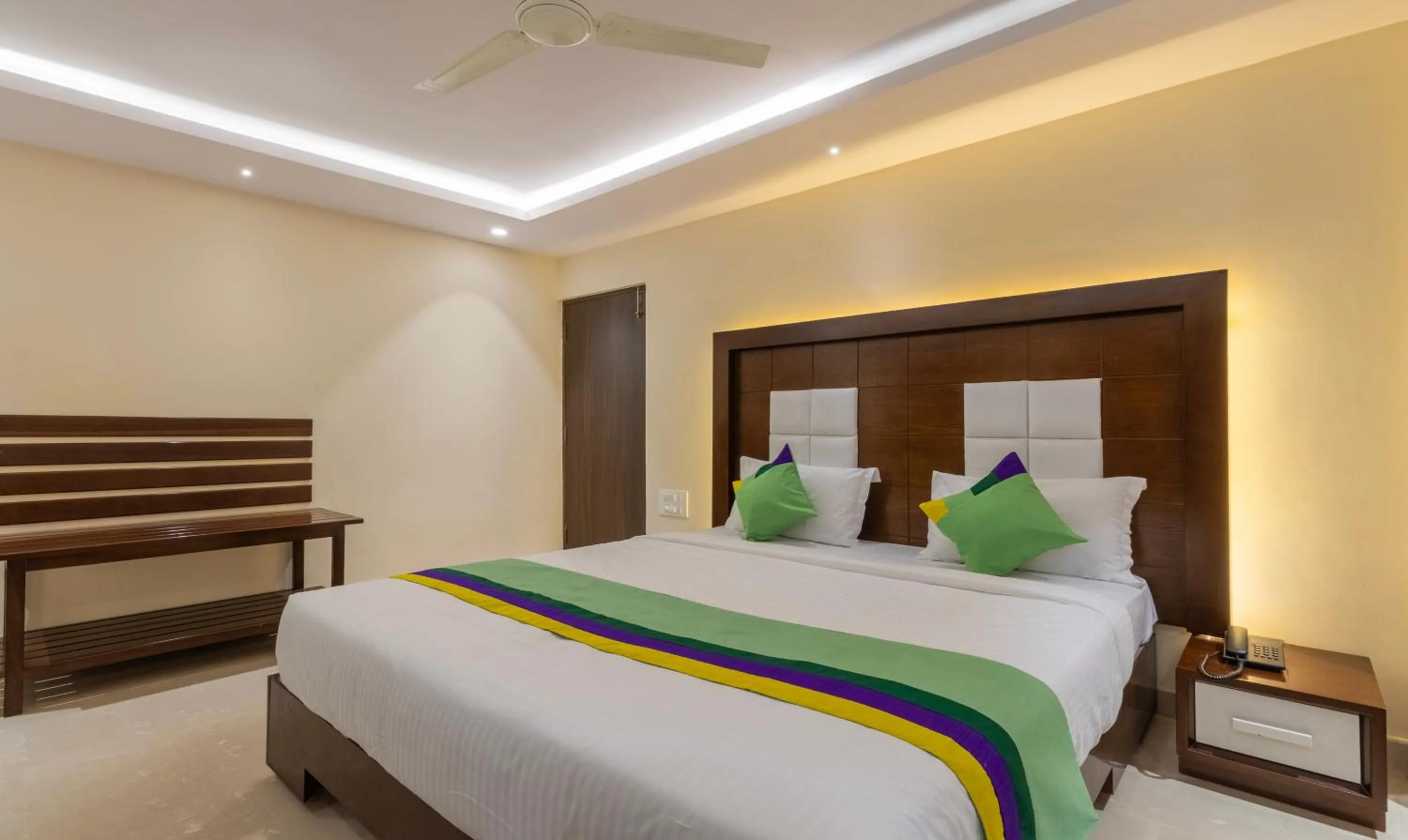 Bedroom, Bed in Treebo Suvarna Comforts