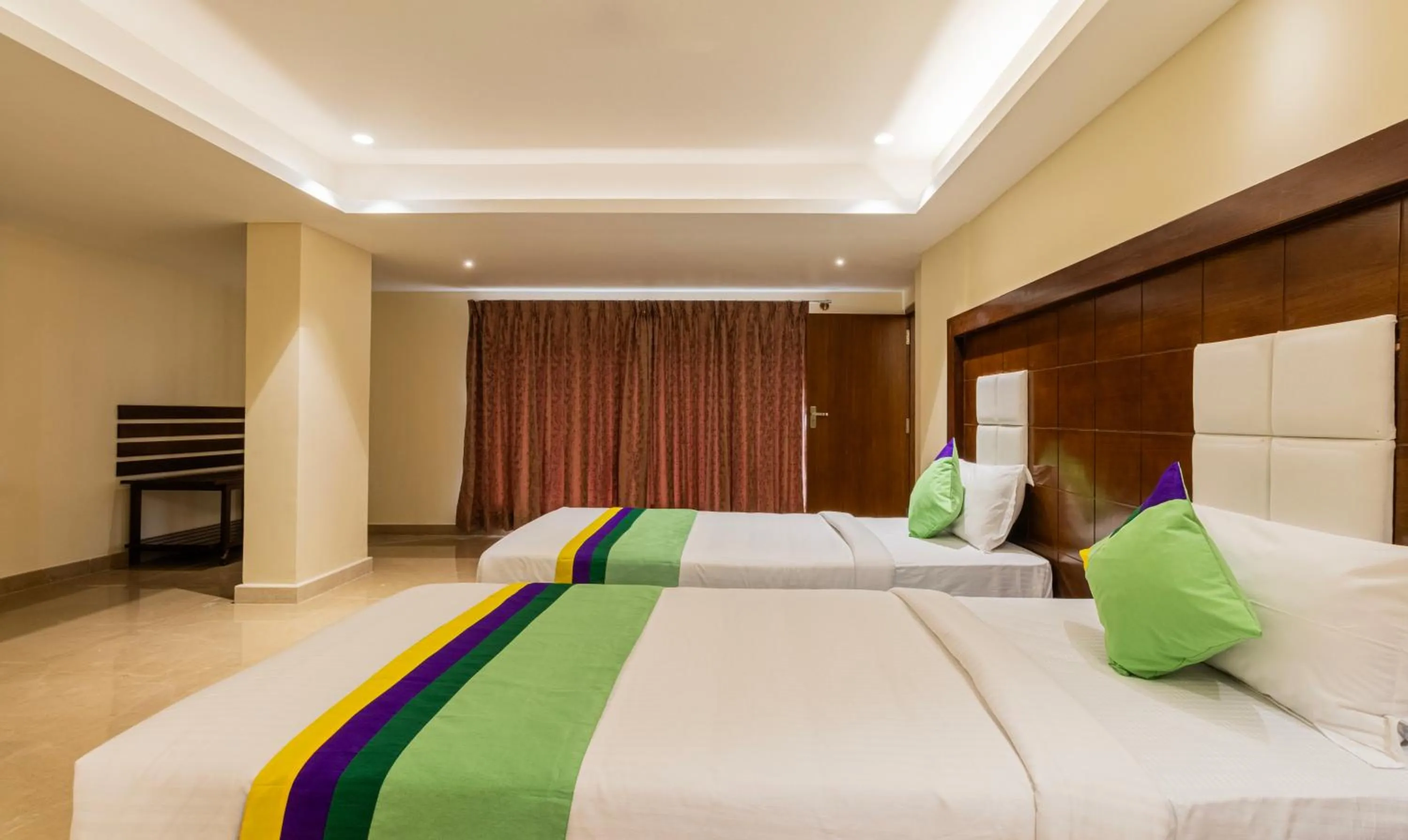 Bedroom, Bed in Treebo Suvarna Comforts