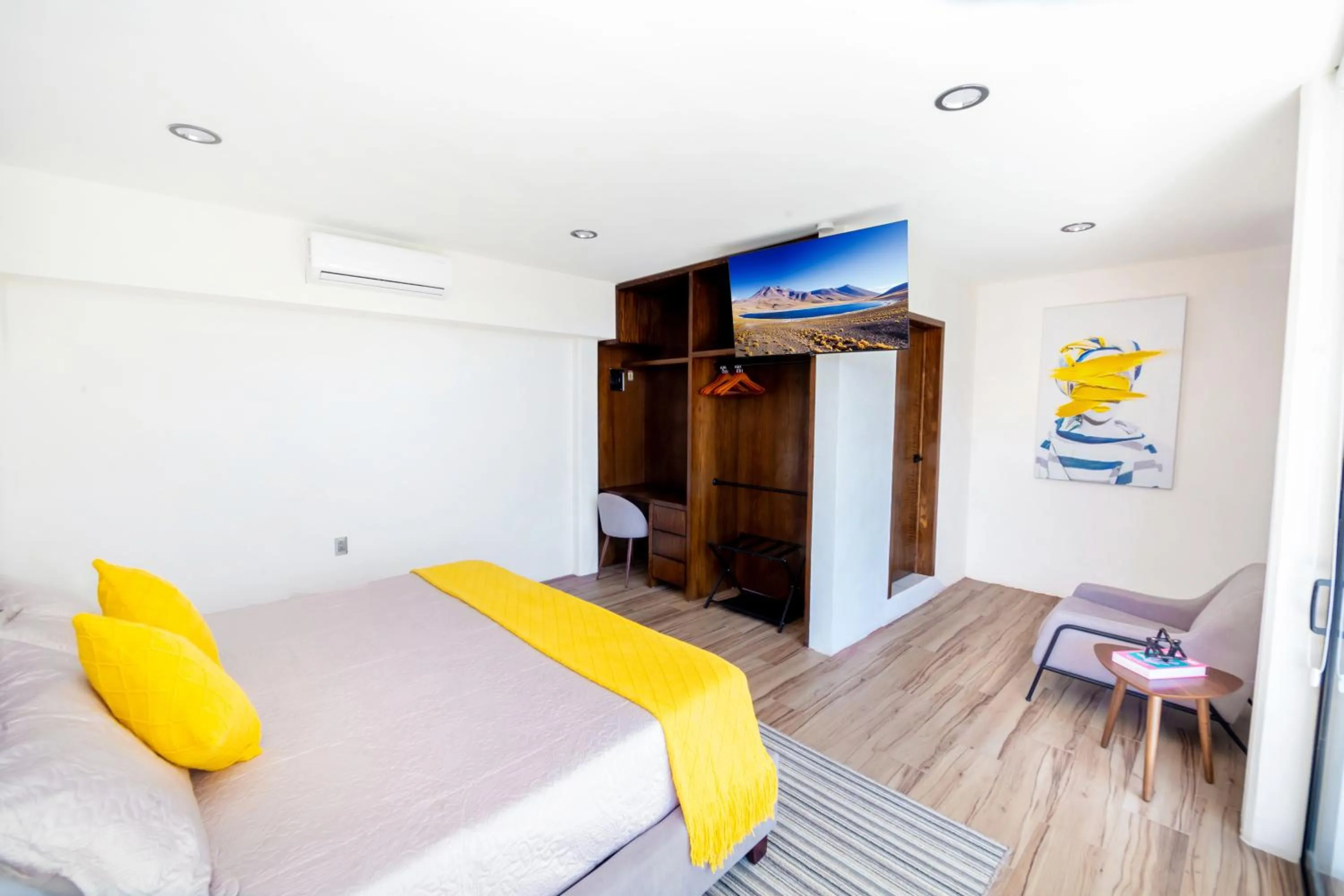 Seating area, Bed in KUKO SUITES