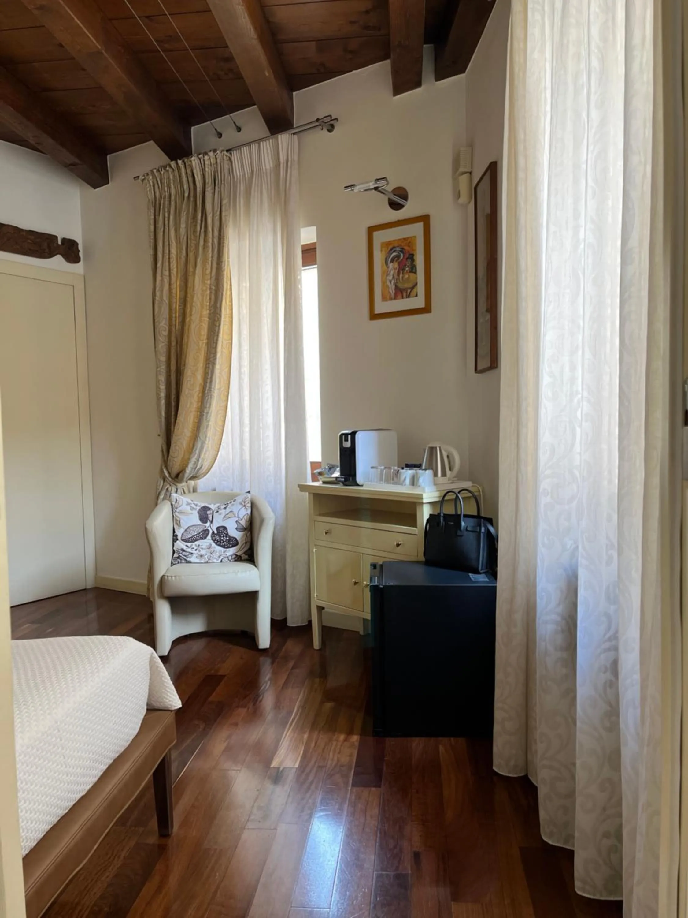 Bed in Relais Ponte Pietra