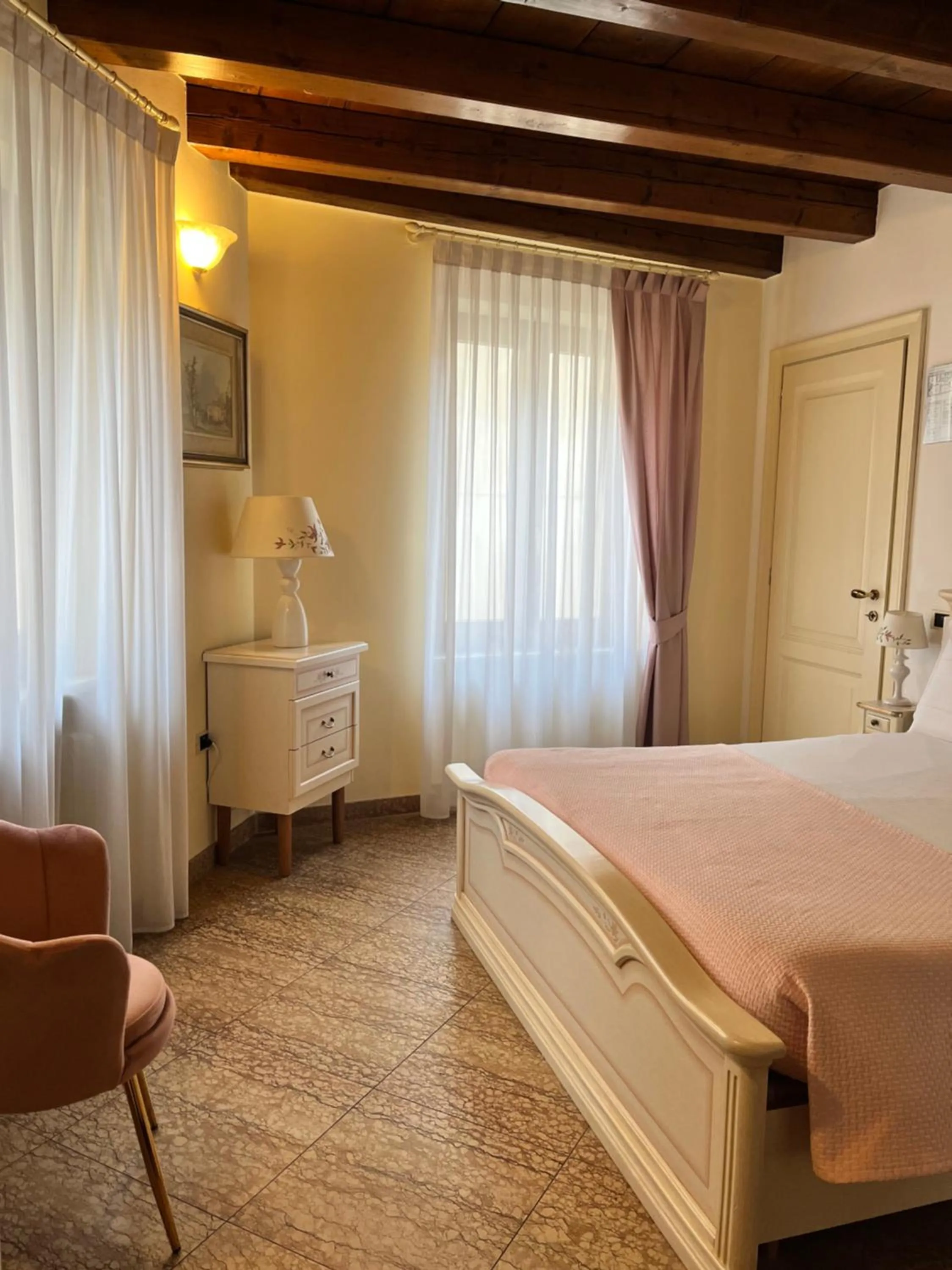 Bed in Relais Ponte Pietra