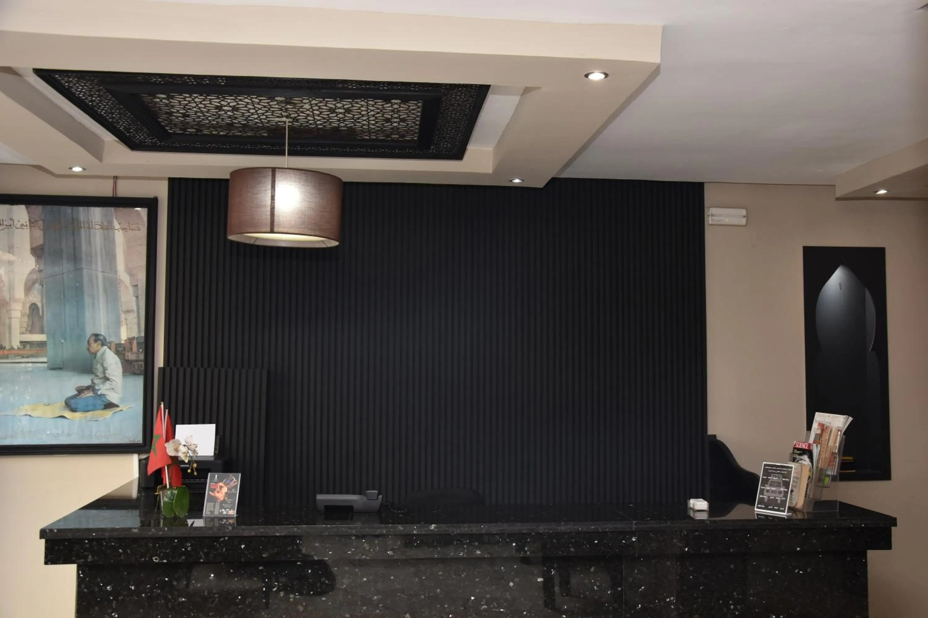 Lobby or reception in Cadé Hotel