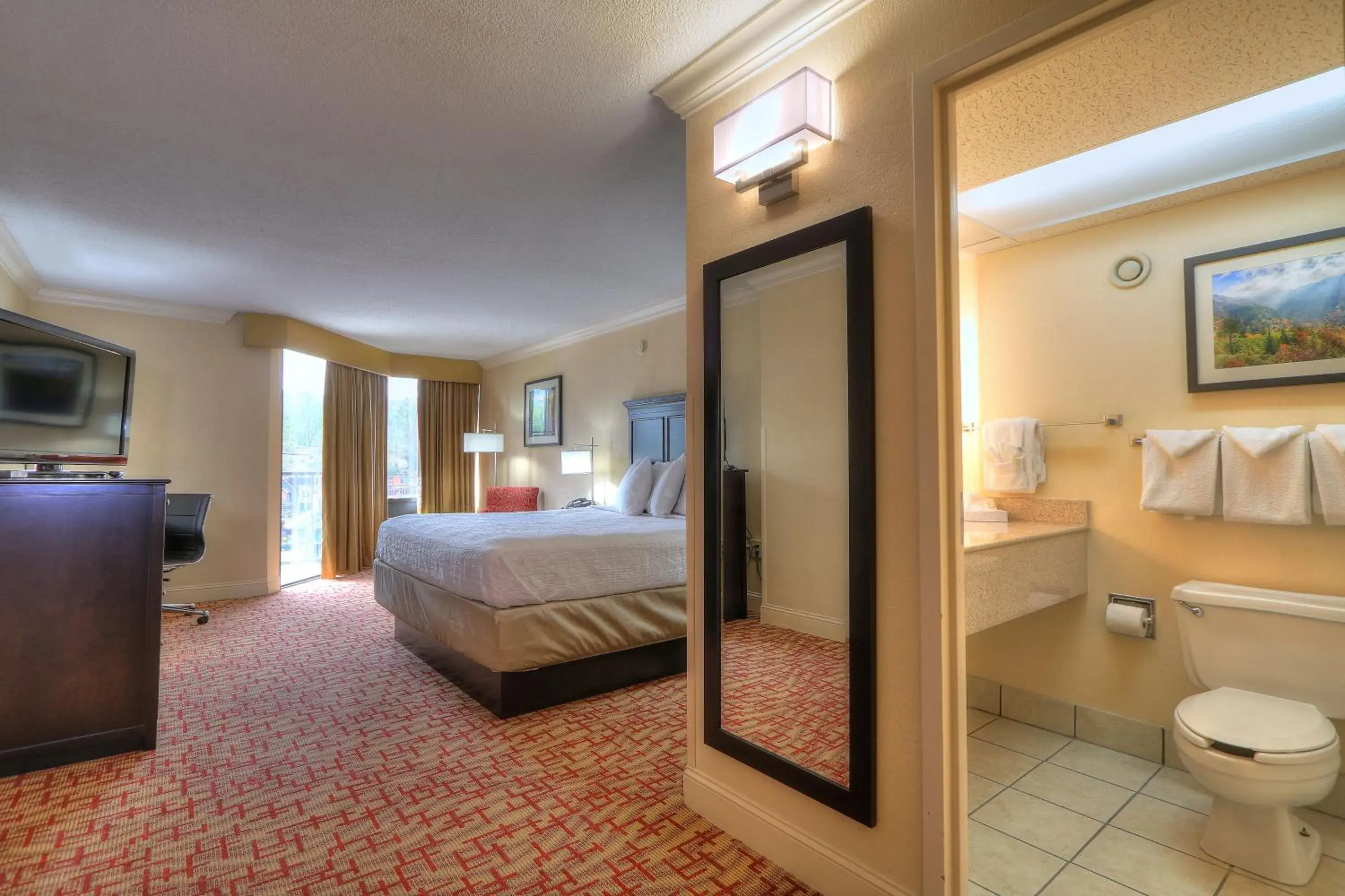 Toilet, Bed in Edgewater Hotel and Conference Center Toilet, Bed in Edgewater Hotel and Conference Center