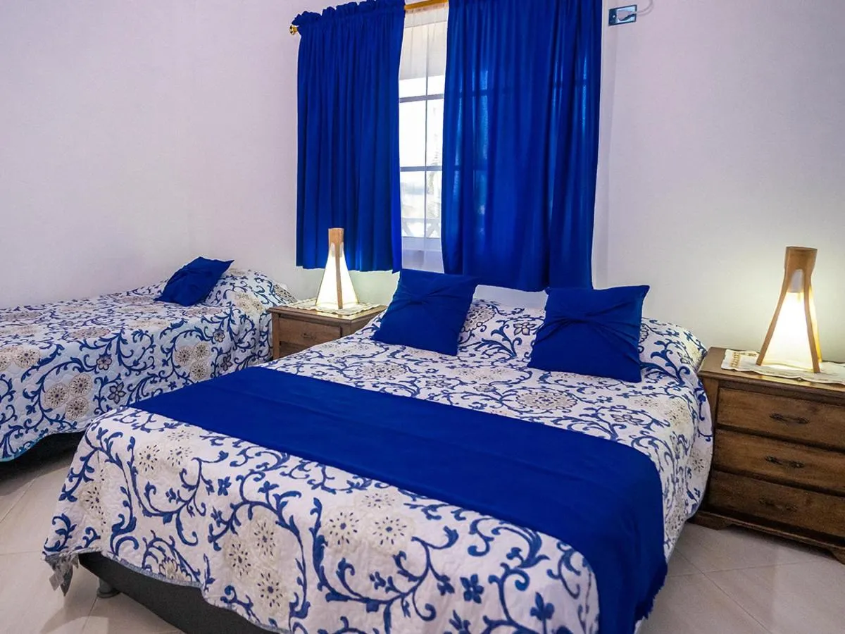 Bed in Posada Sunshine Paradise