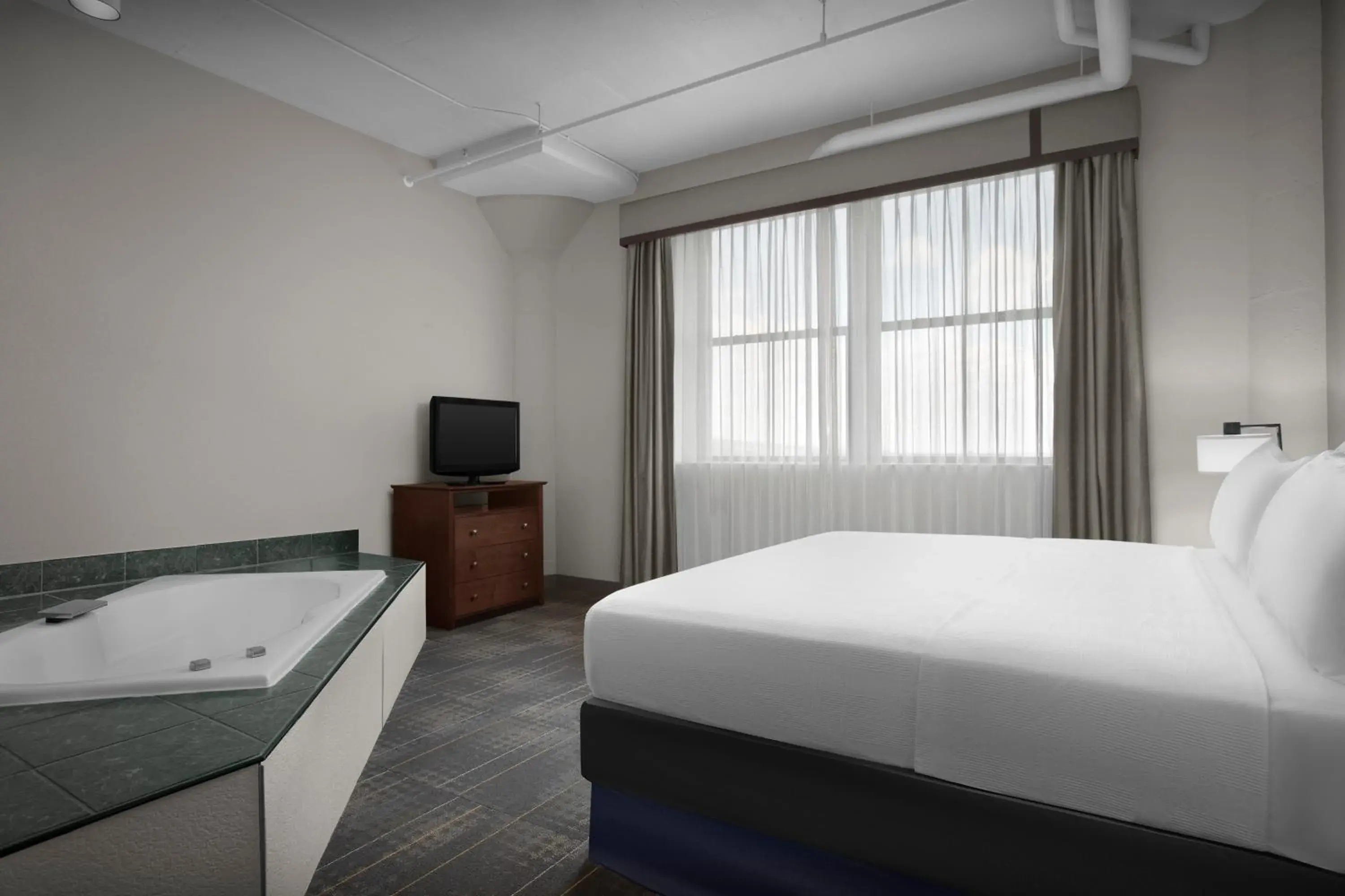 One-Bedroom King Suite with Spa Bath in The Suites Hotel at Waterfront Plaza One-Bedroom King Suite with Spa Bath in The Suites Hotel at Waterfront Plaza