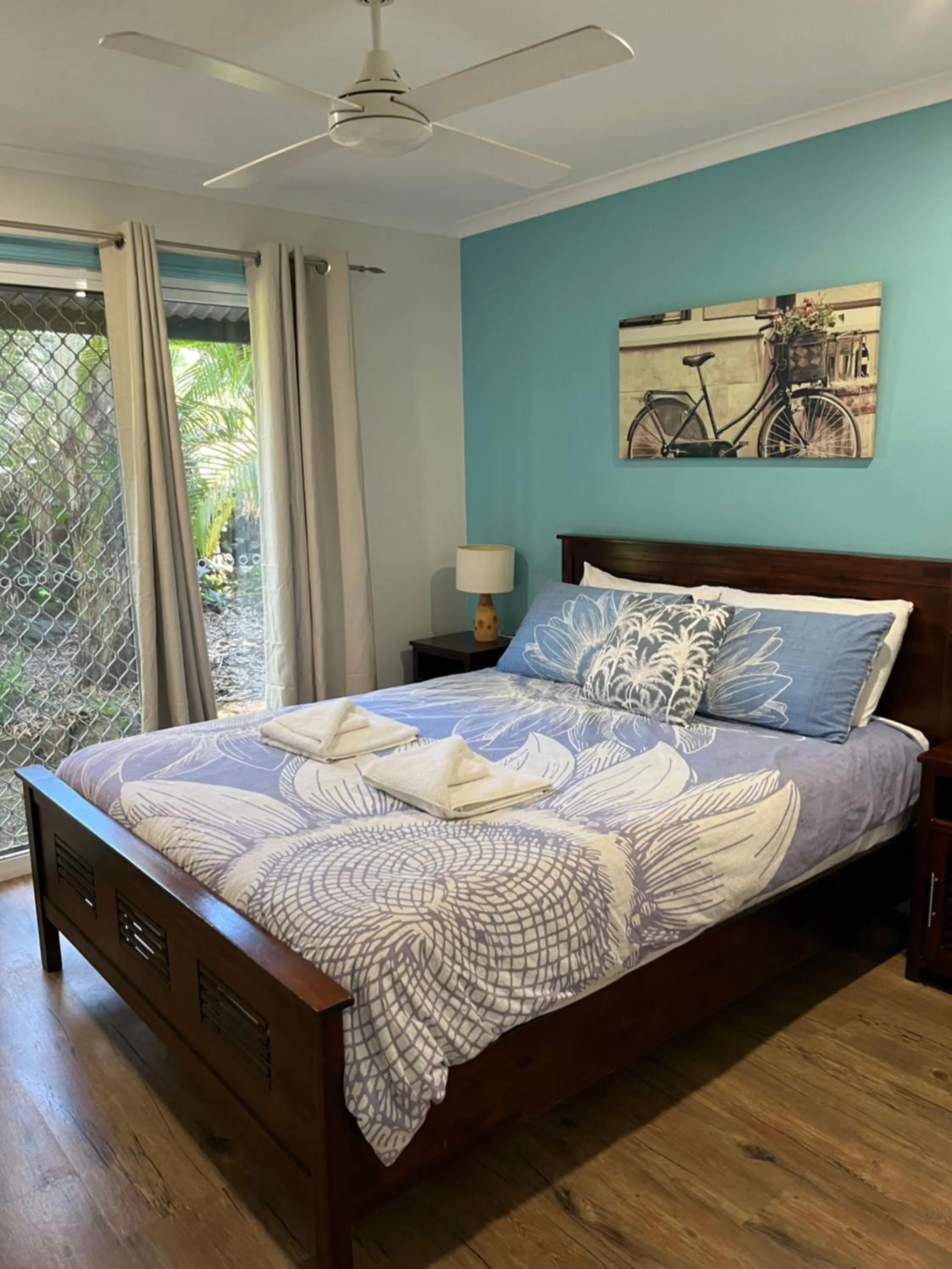 Bed in Safety Beach Bungalows