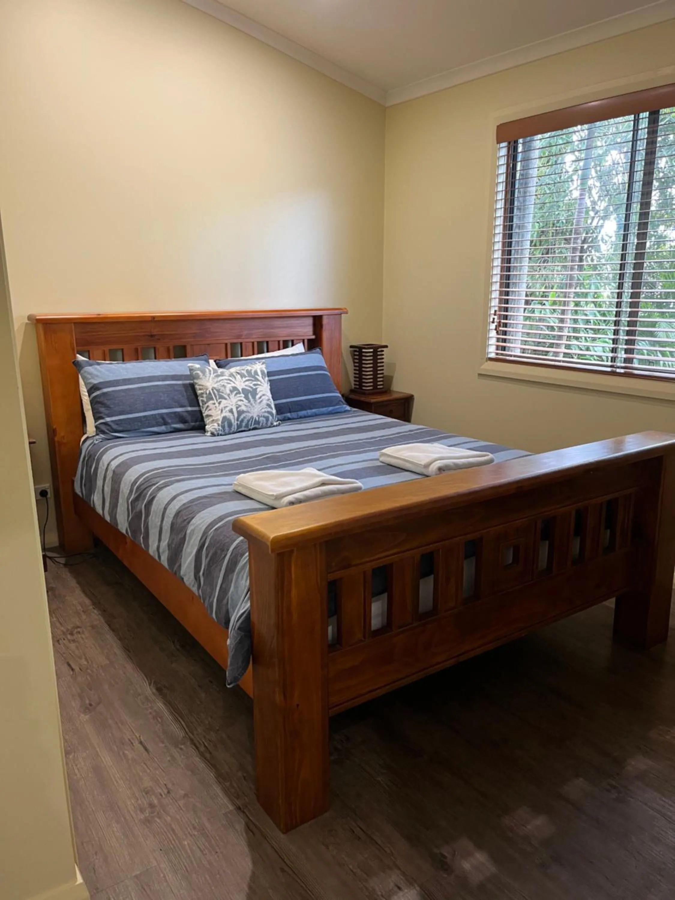 Bed in Safety Beach Bungalows