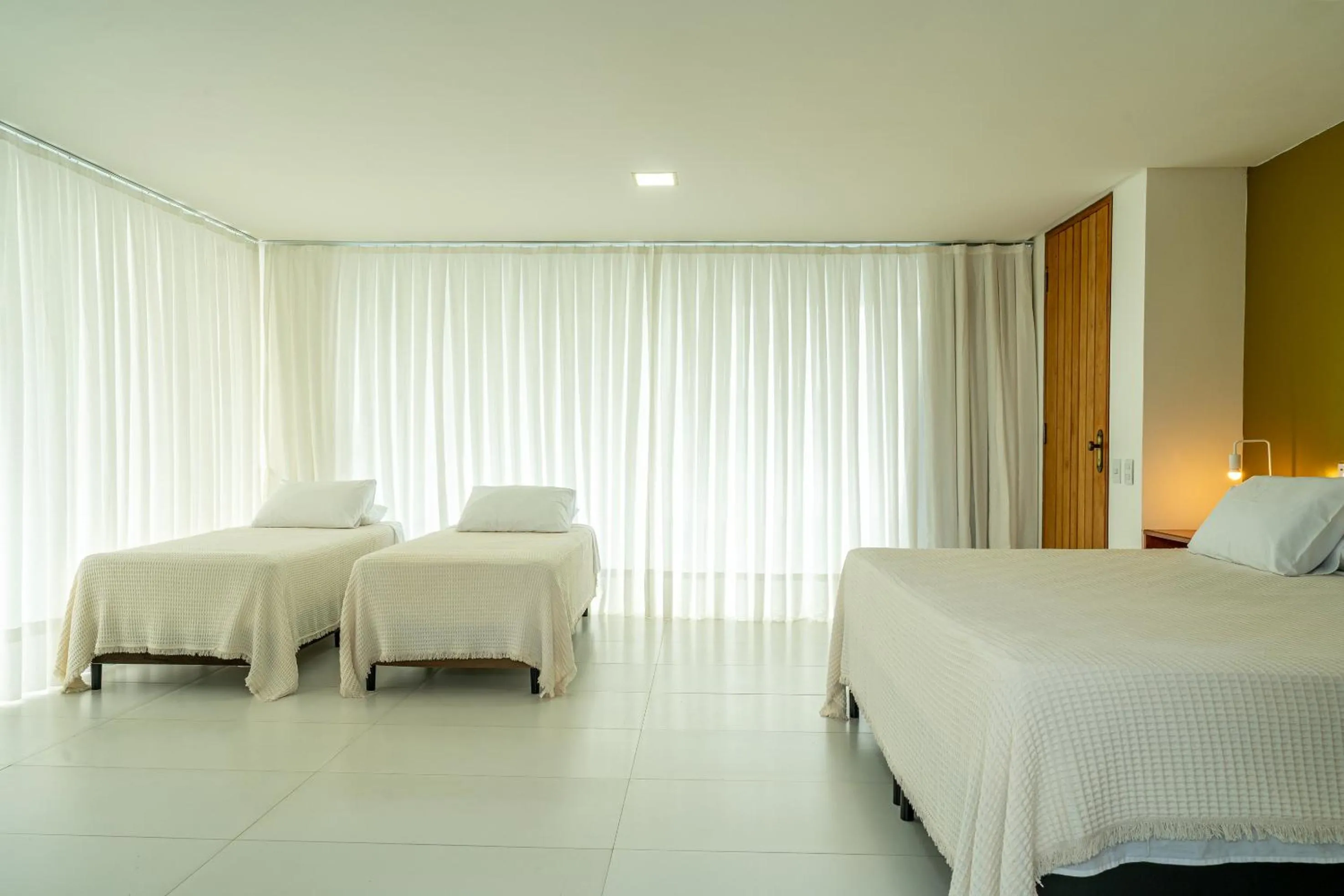 Bed in Pousada Corais de Ibiza