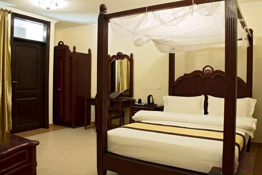 Bed in Island Paradise Inn