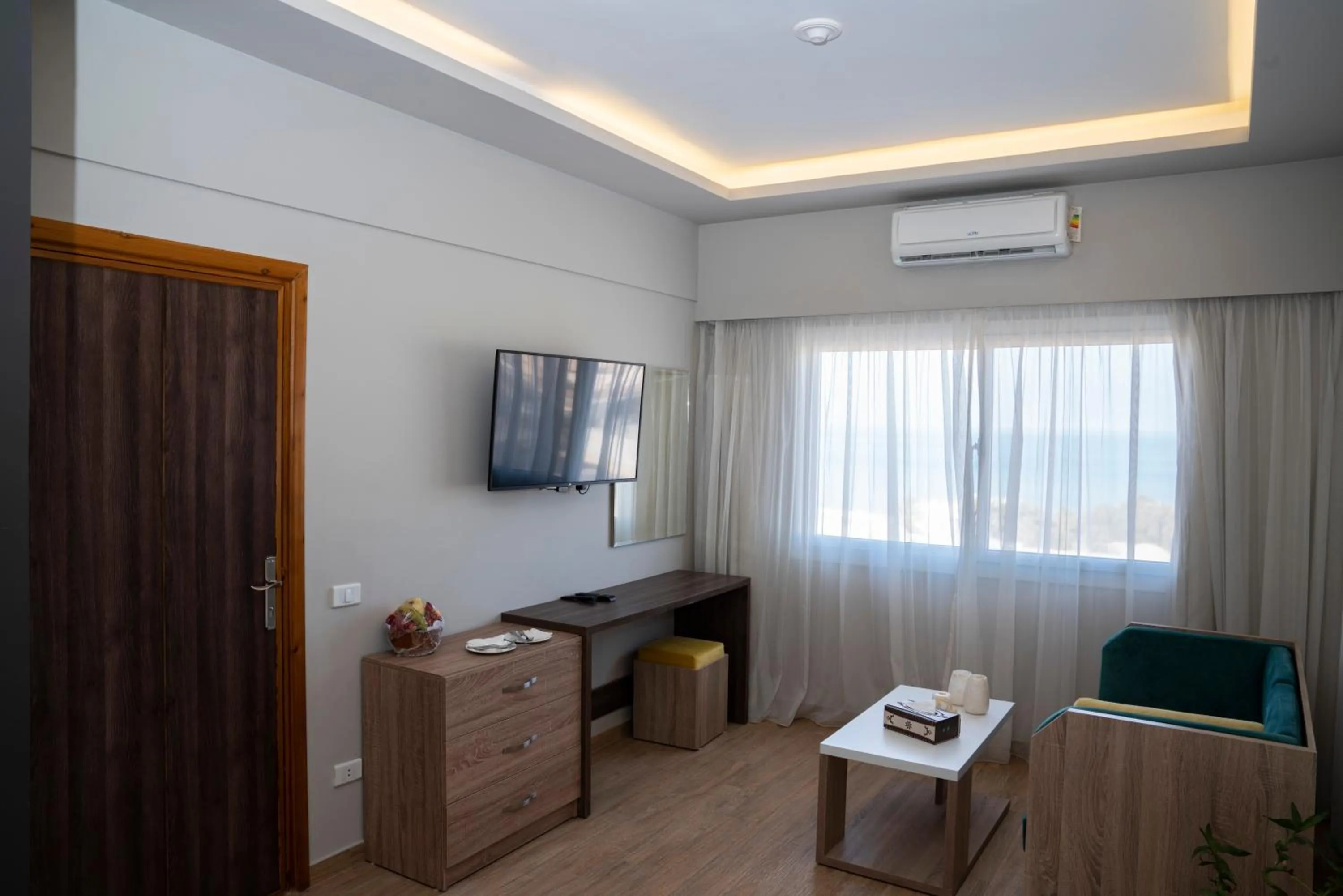 Communal lounge/ TV room in Al-Dora Beach Resort