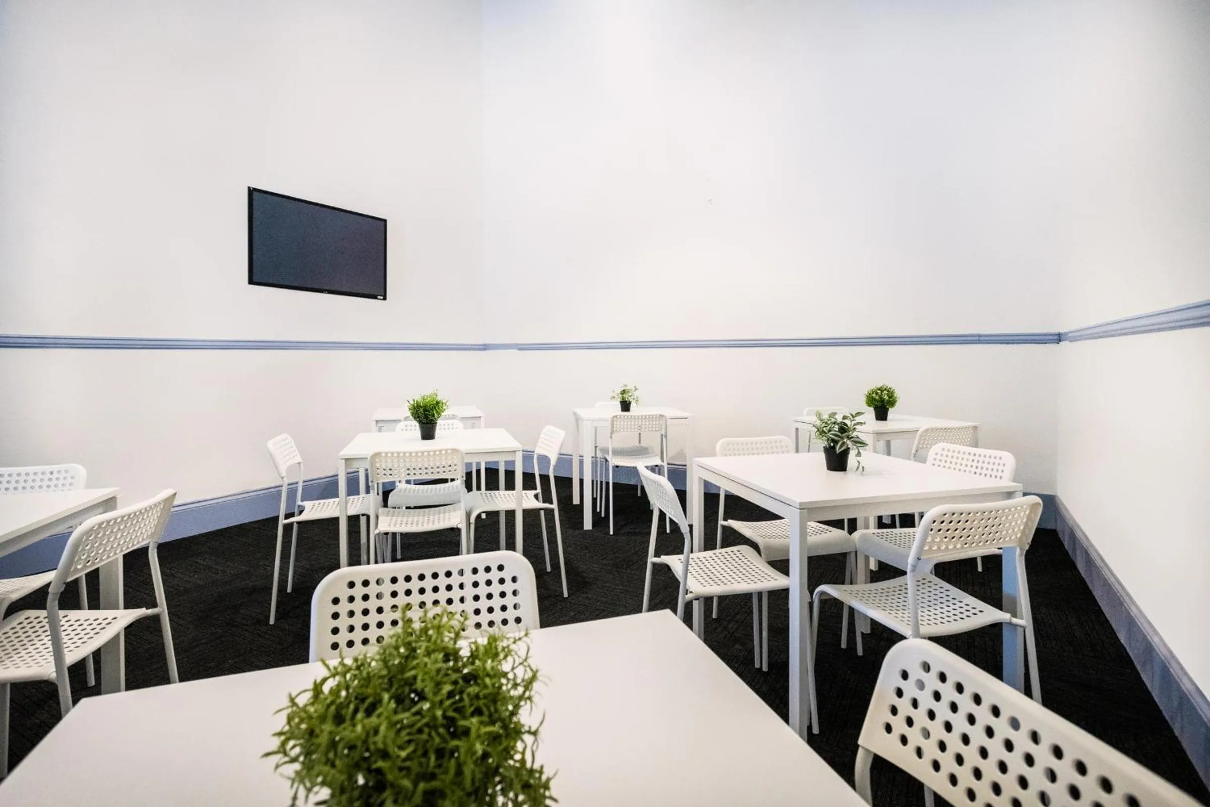 Communal lounge/ TV room in Base Camp Hostel