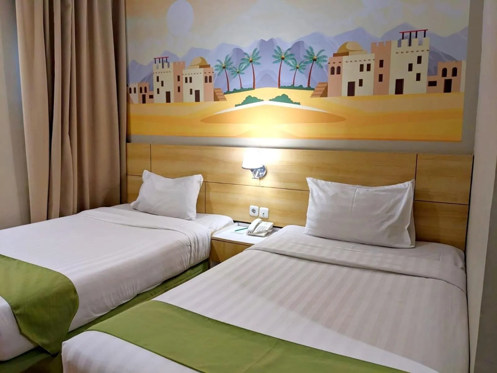 Bed in Lorin Syariah Hotel Sentul