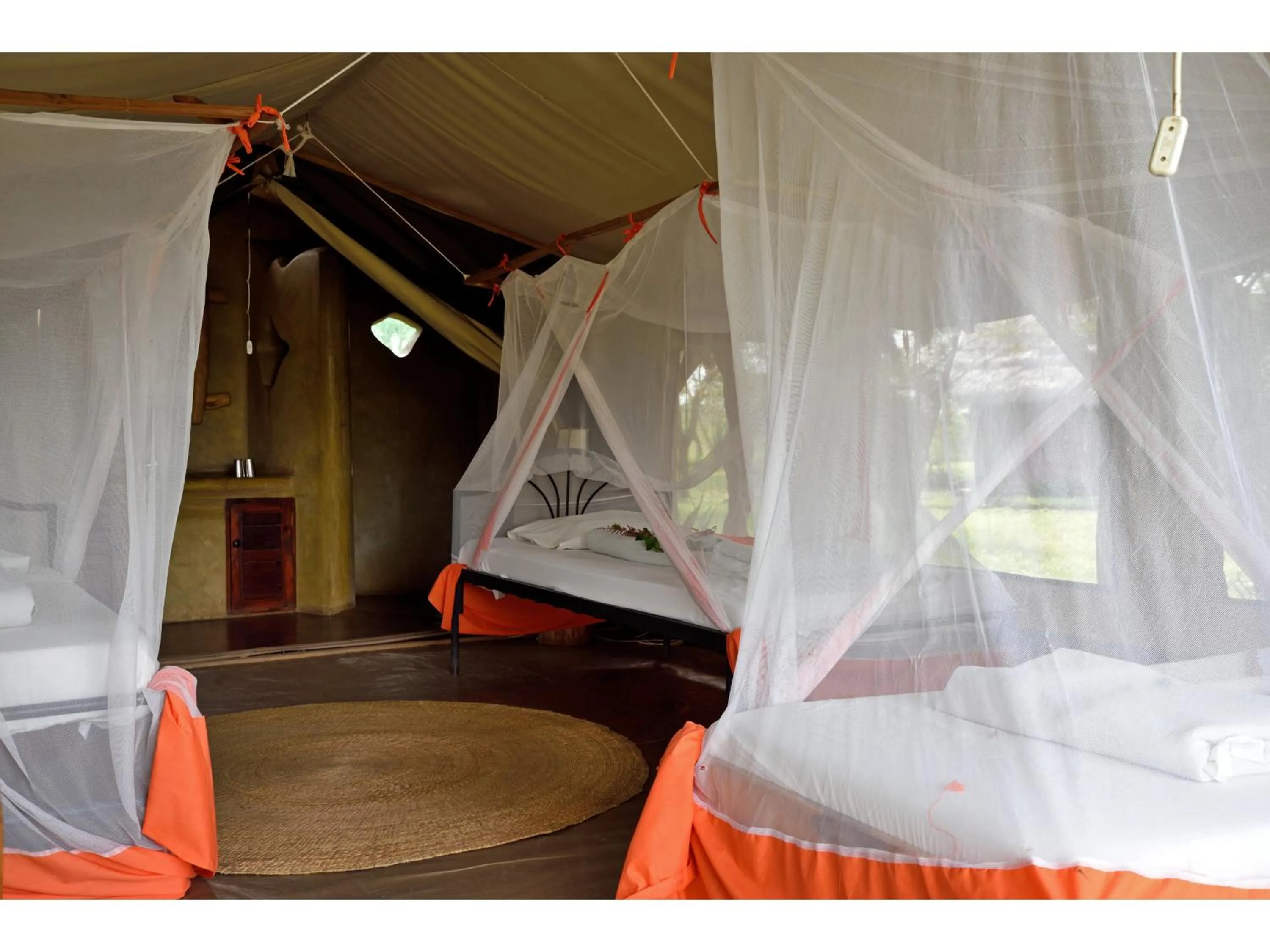 Bed in Ikoma Bush Camp