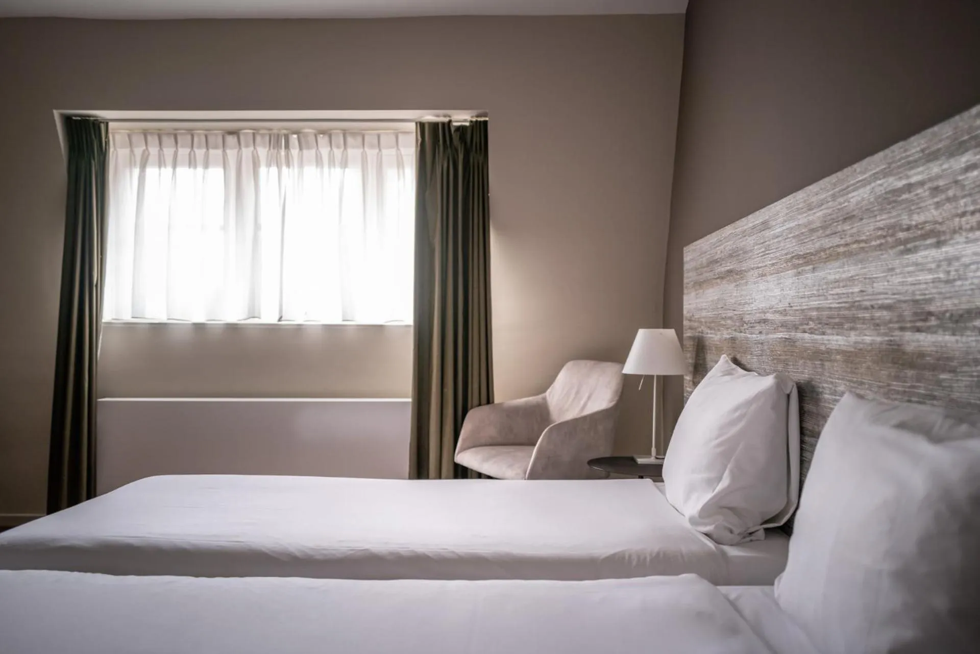 Bed in Hotel Au Quartier