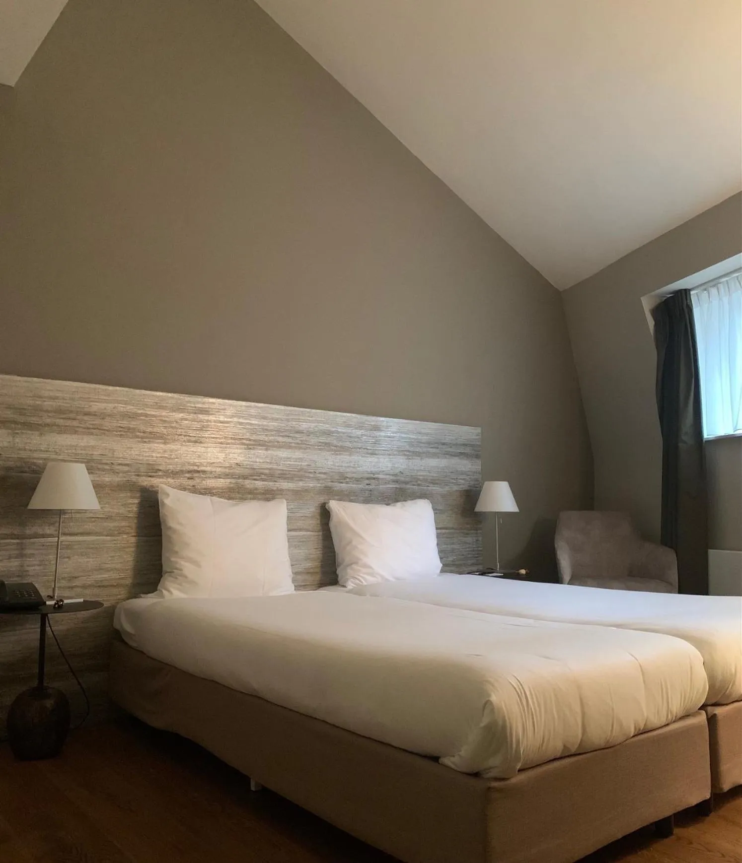 Bed in Hotel Au Quartier