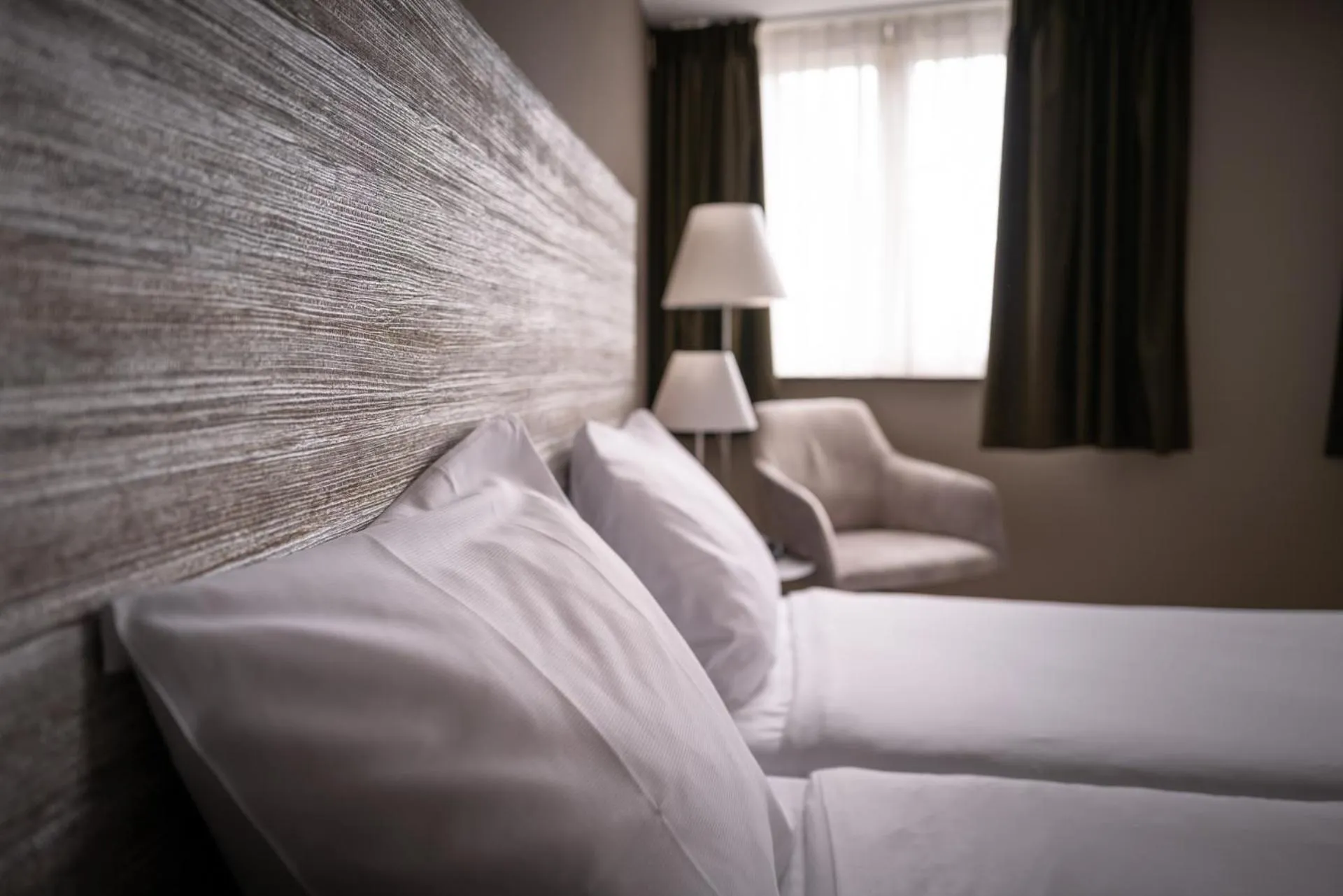 Bed in Hotel Au Quartier