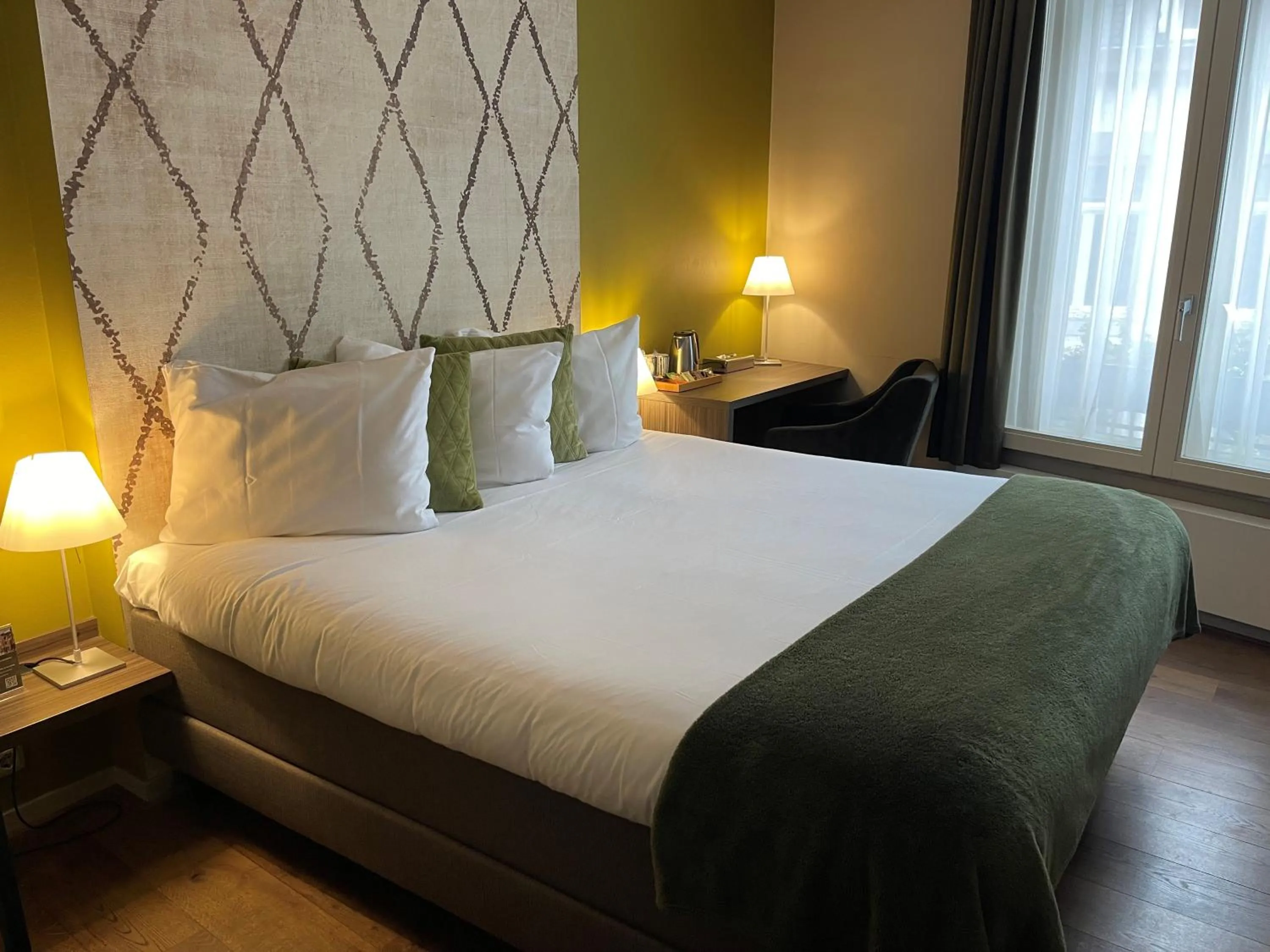 Bed in Hotel Au Quartier