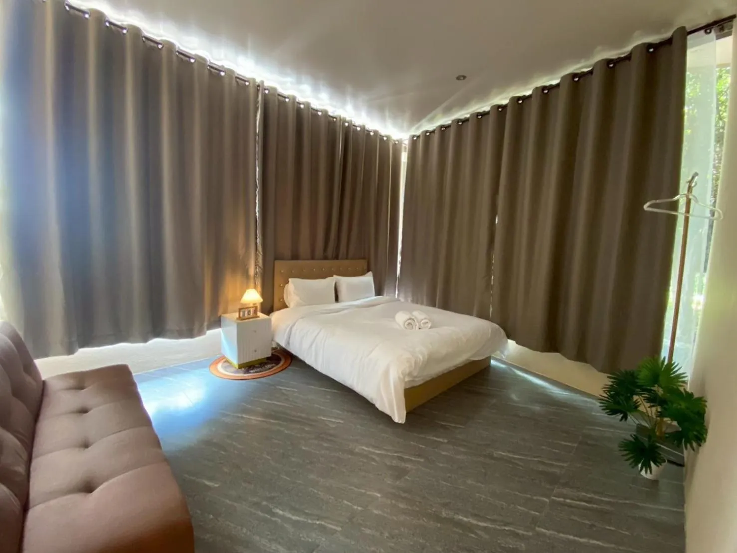 Bed in Grand Bangsaen Hotel