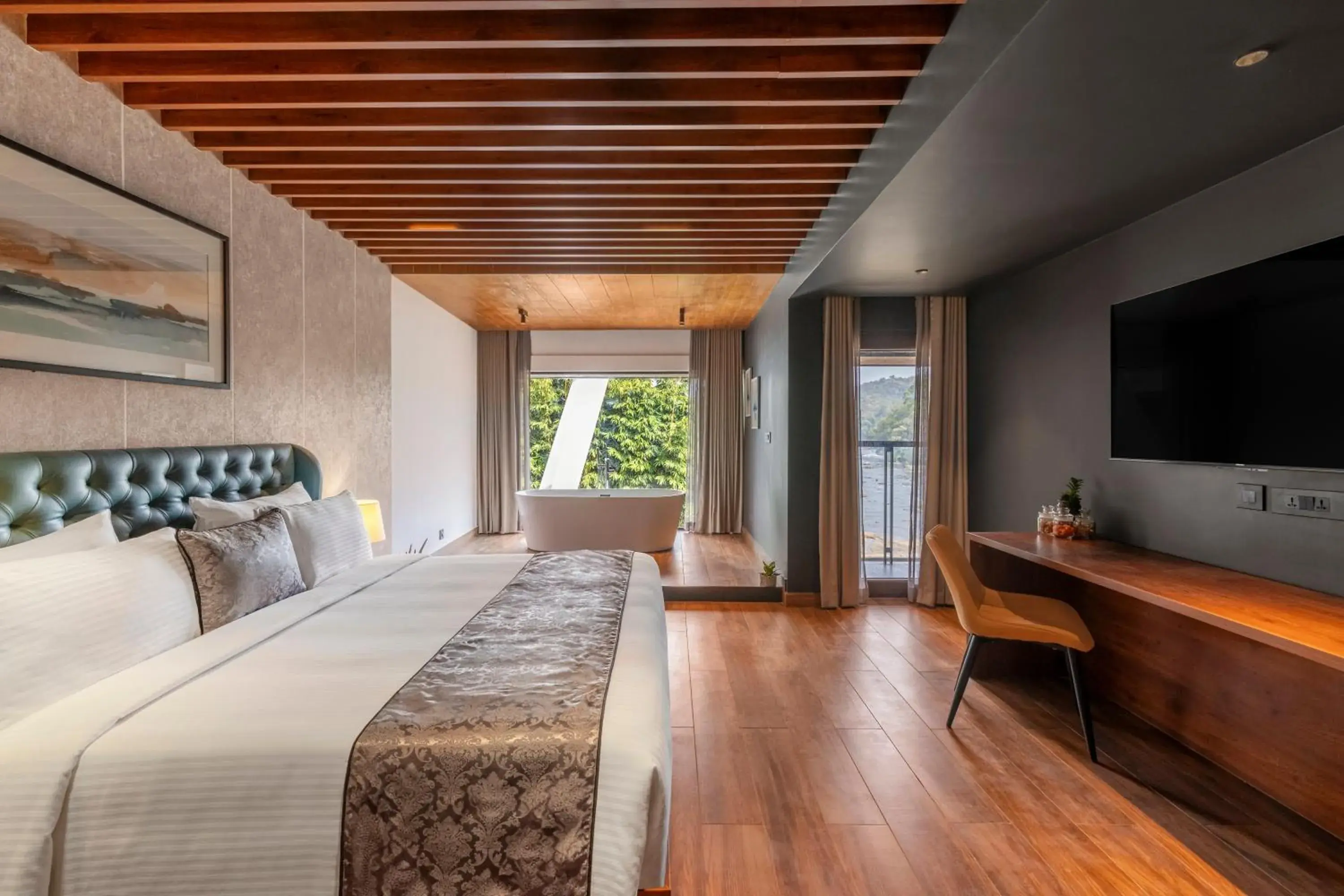 Communal lounge/ TV room, Bed in Sterling Athirappilly Communal lounge/ TV room, Bed in Sterling Athirappilly