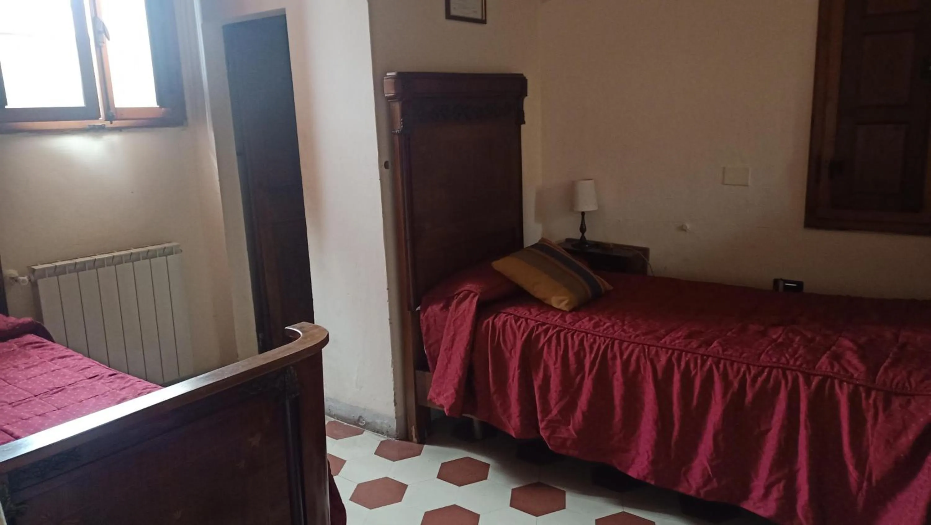 Bed, TV/Entertainment Center in Relais Corso Storico