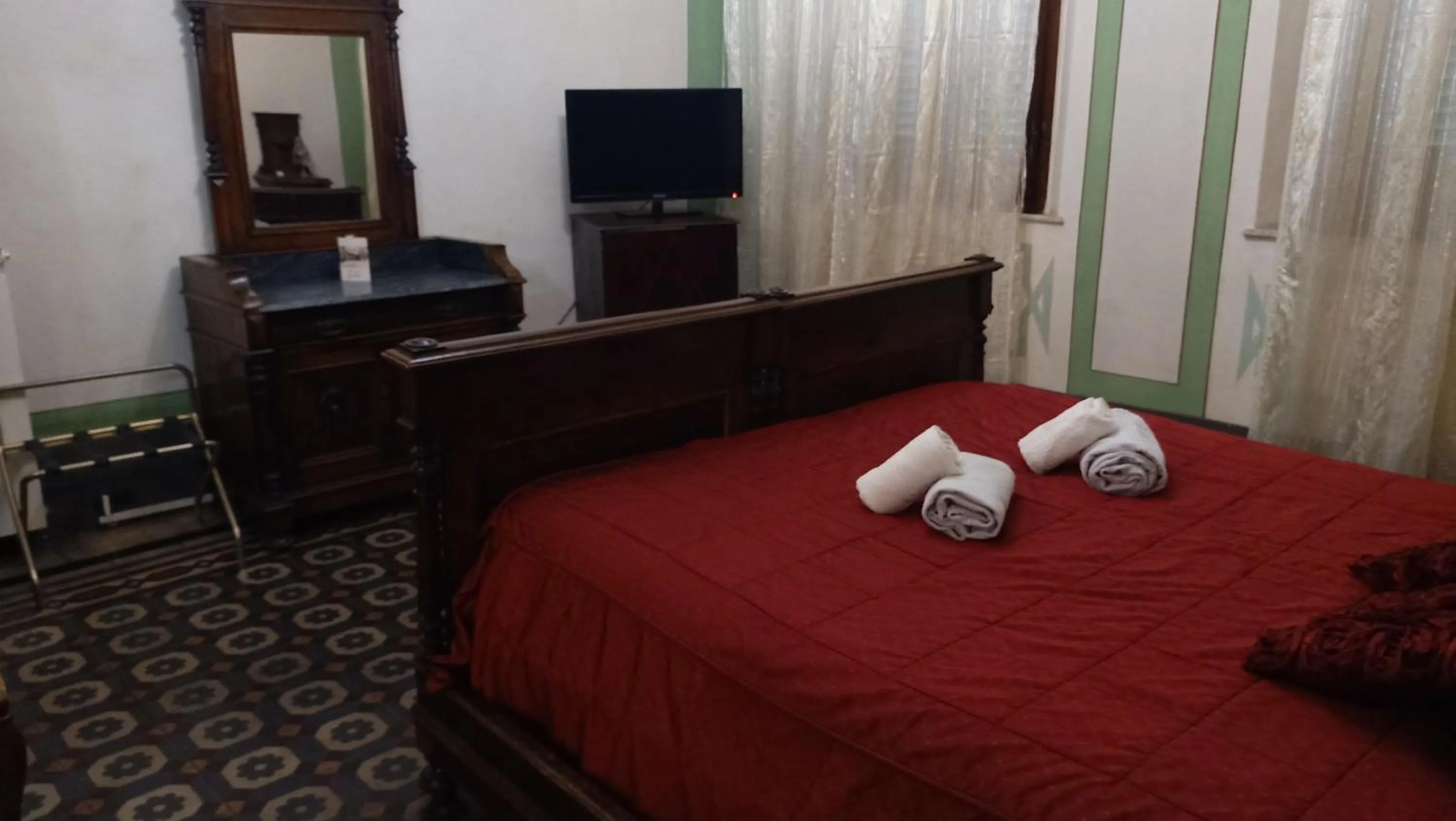Bed, TV/Entertainment Center in Relais Corso Storico