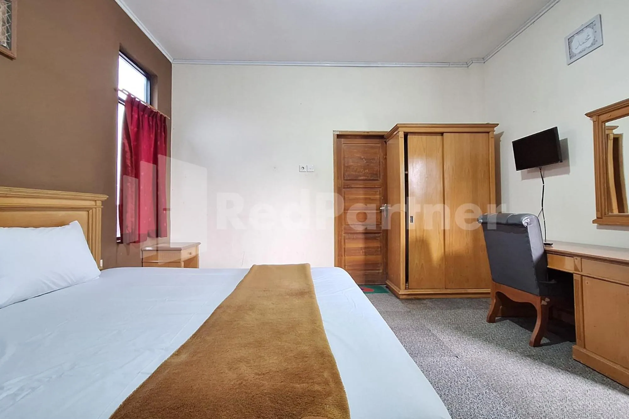 Bedroom, Bed in Hotel Graha Muslim RedPartner