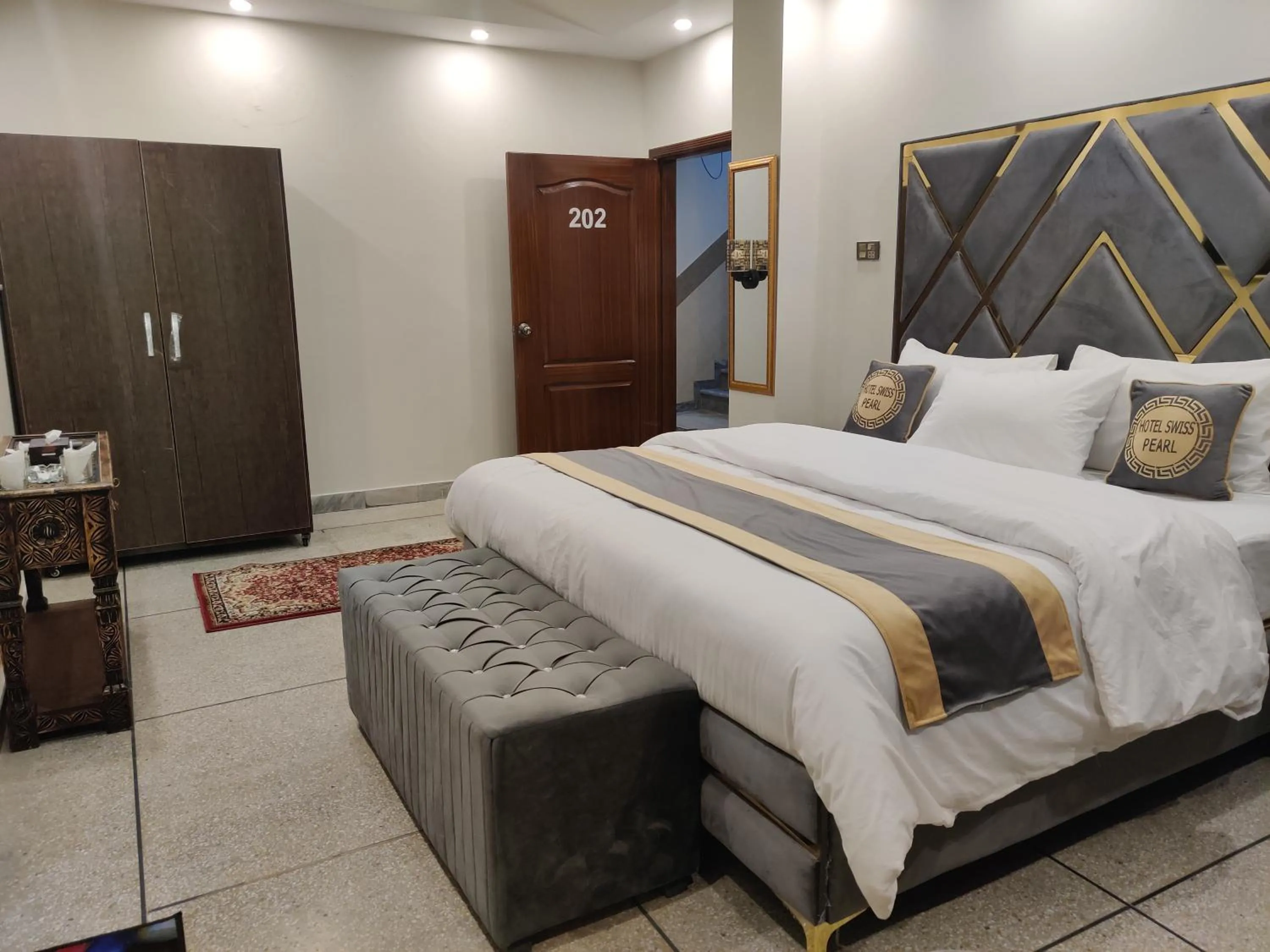 Bed in Hotel Swiss Pearl