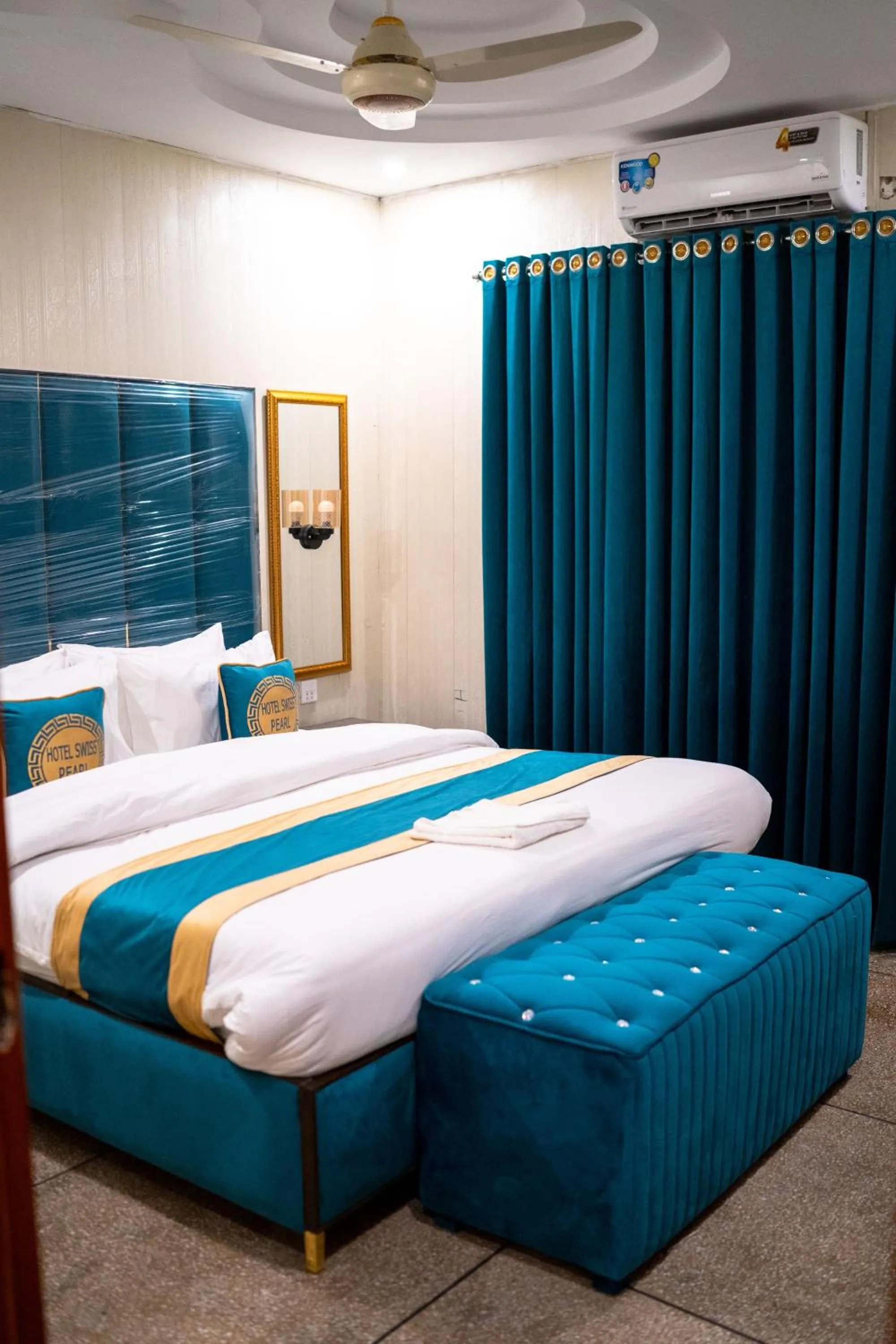 Bed in Hotel Swiss Pearl