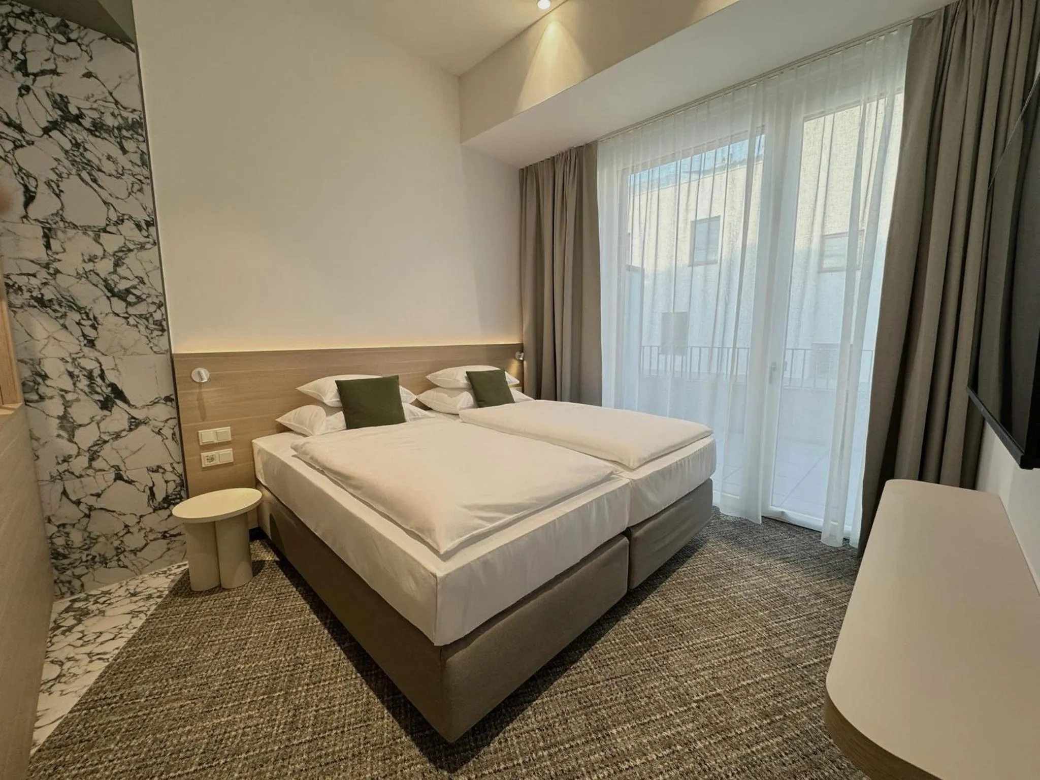 Bed in ARCOTEL AQ Wien