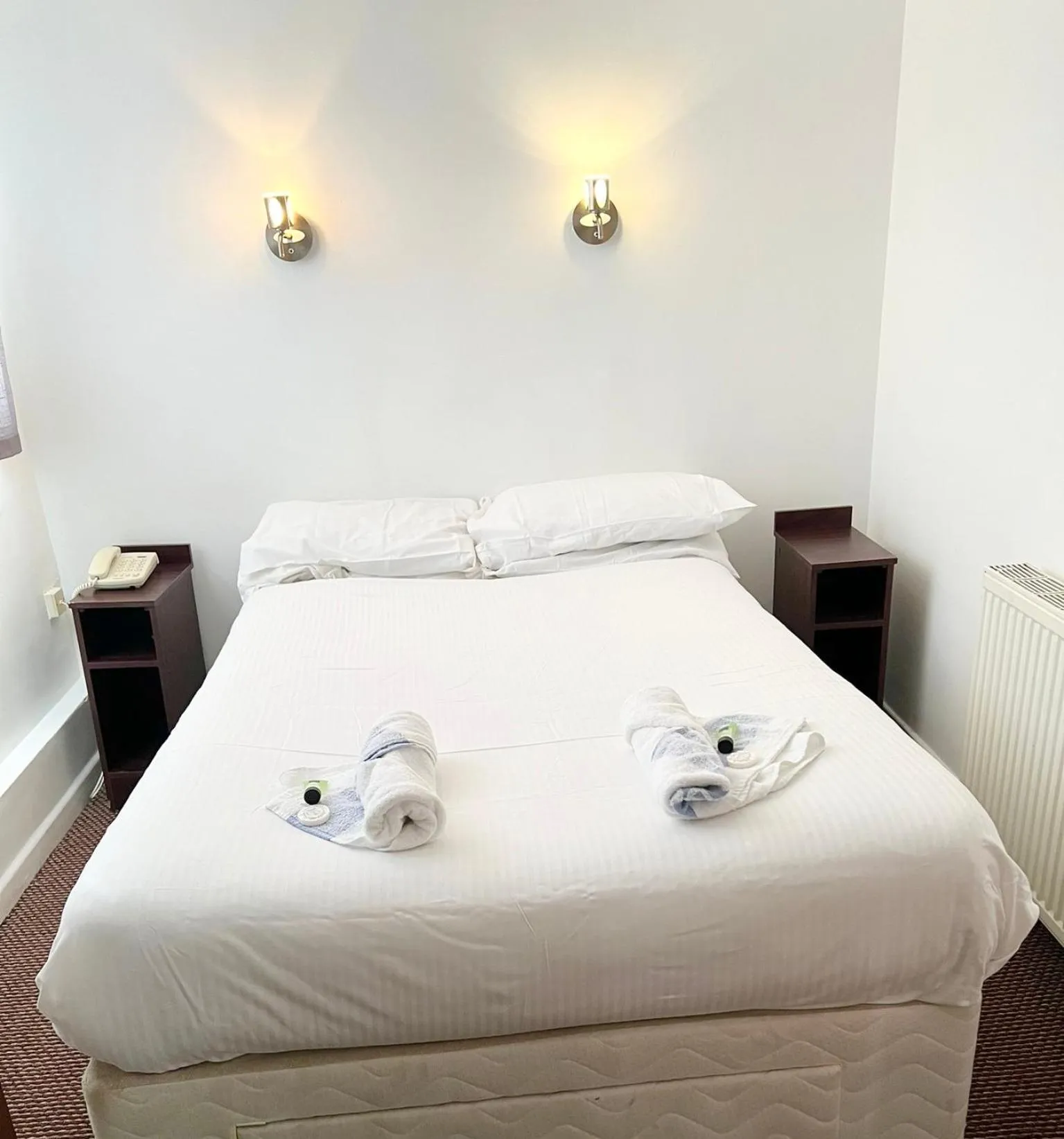 Bed in The Embassy Hotel