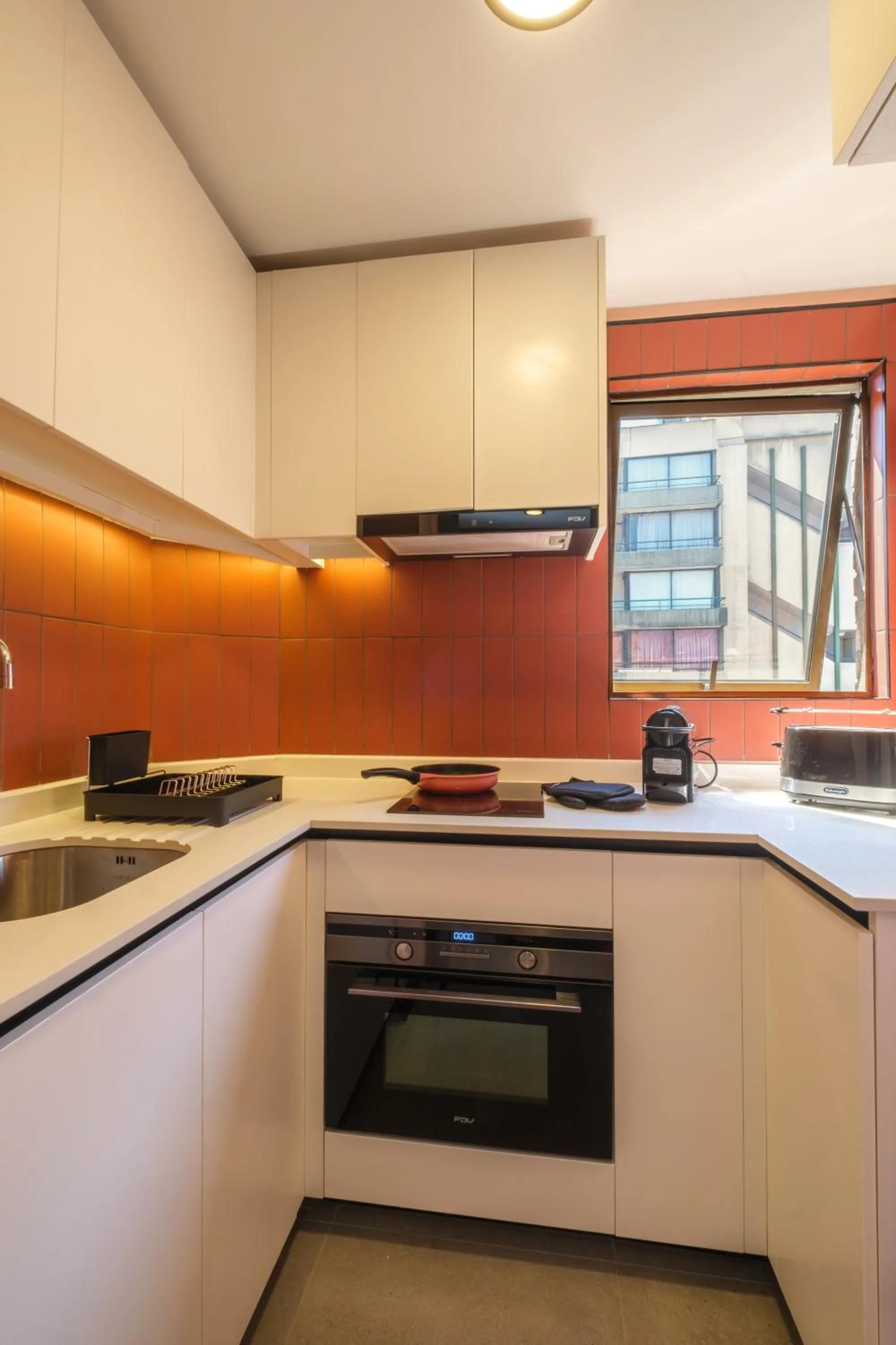 Kitchen or kitchenette in APT Serviced Apartments Santiago