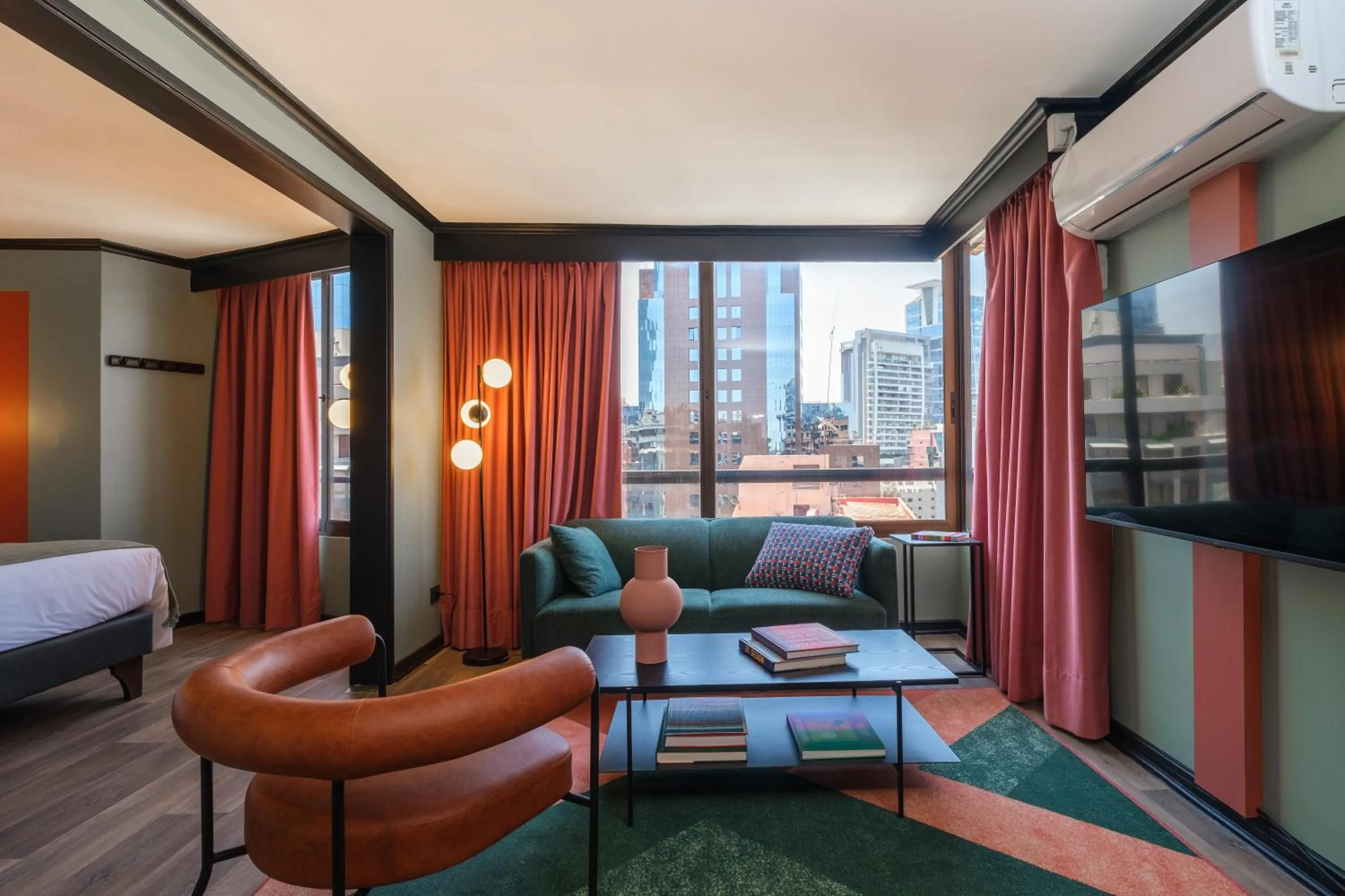 Living room, Bed in APT Serviced Apartments Santiago