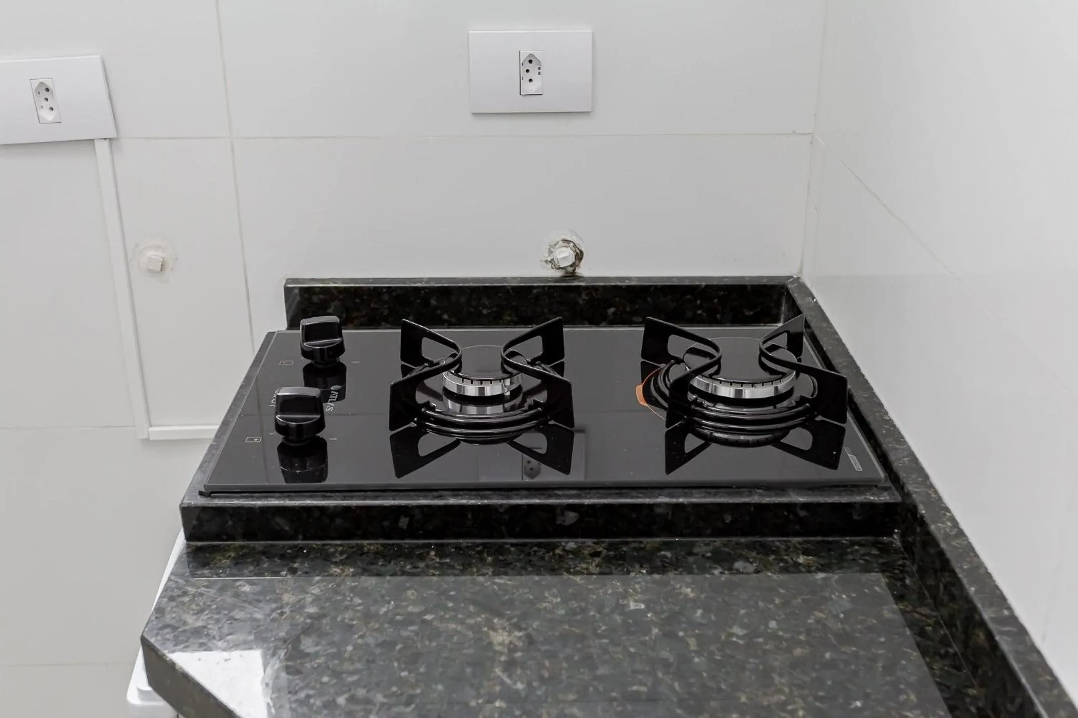 Kitchen or kitchenette in Ed. Charlie Chaplin | Prédio no coração de Curitiba | Gonzaga Stays