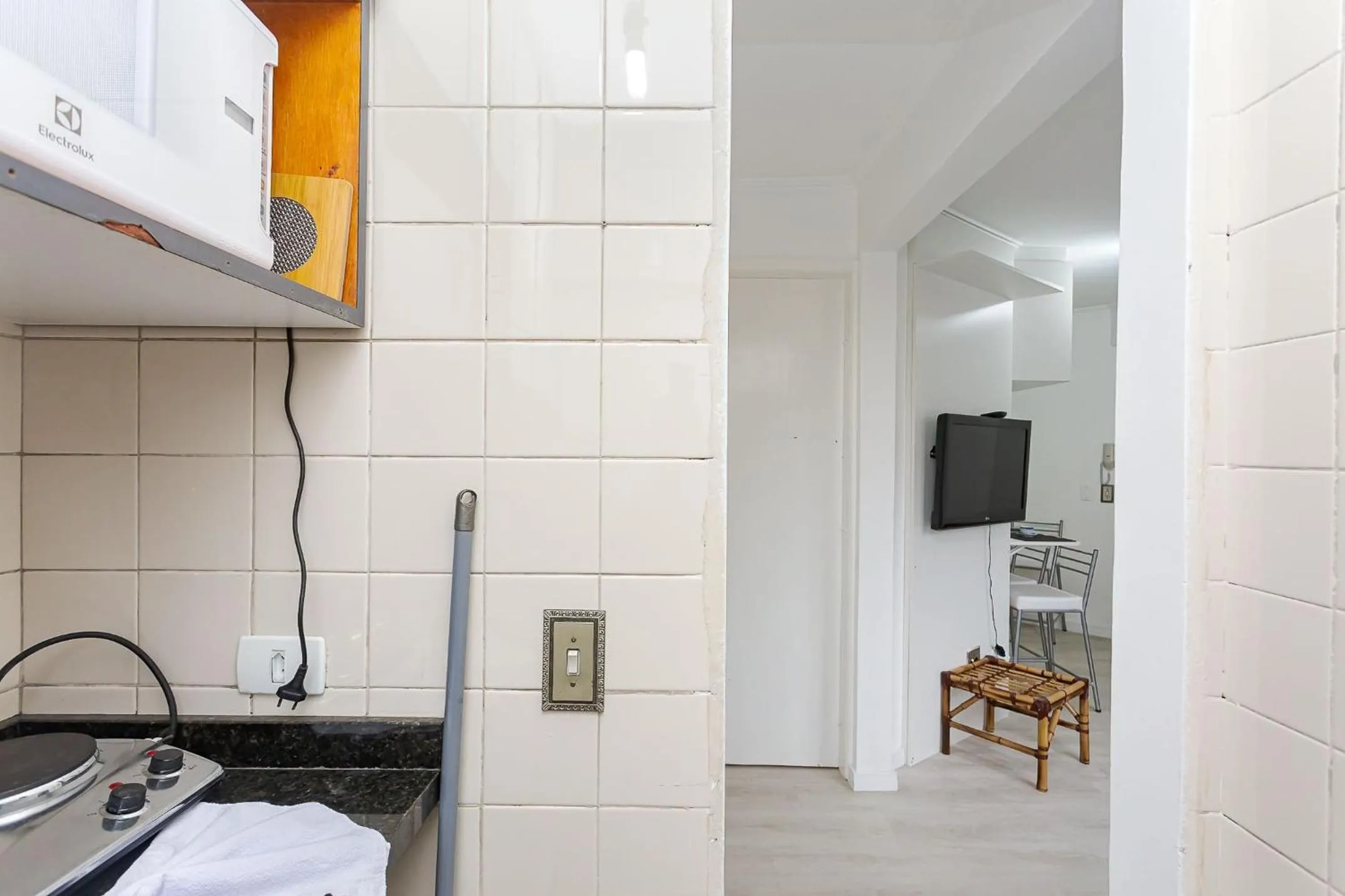 Kitchen or kitchenette in Ed. Charlie Chaplin | Prédio no coração de Curitiba | Gonzaga Stays