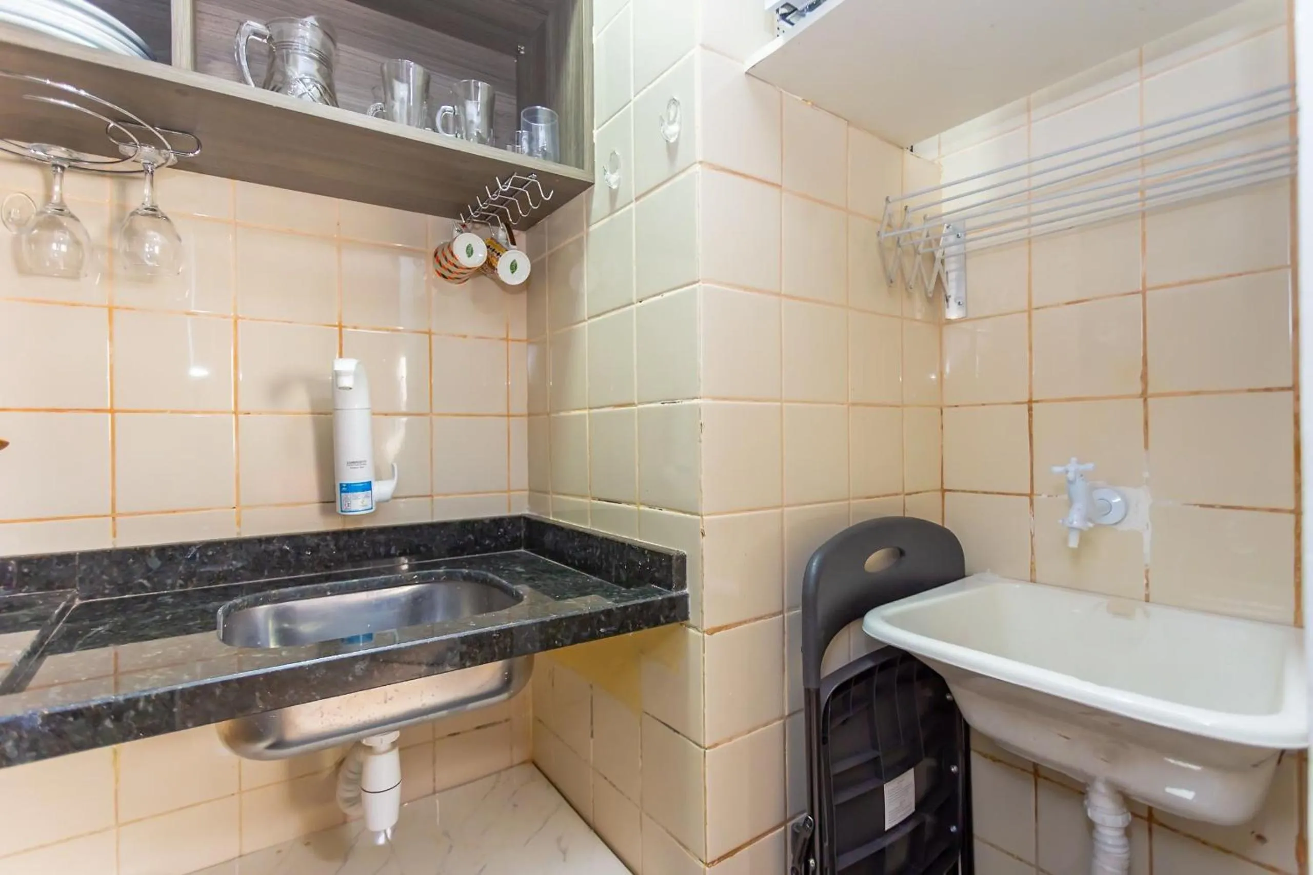 Kitchen or kitchenette in Ed. Charlie Chaplin | Prédio no coração de Curitiba | Gonzaga Stays