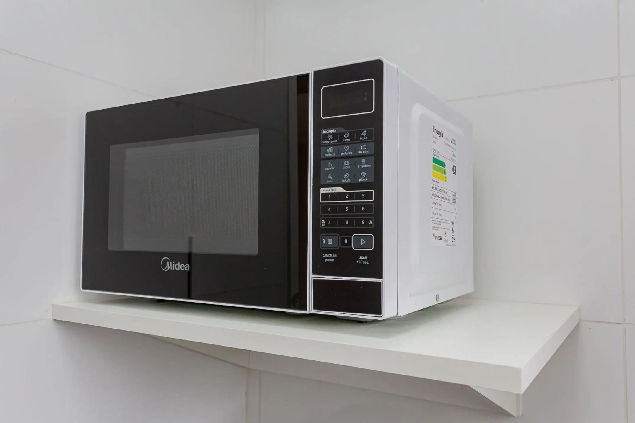 Kitchen or kitchenette in Ed. Charlie Chaplin | Prédio no coração de Curitiba | Gonzaga Stays