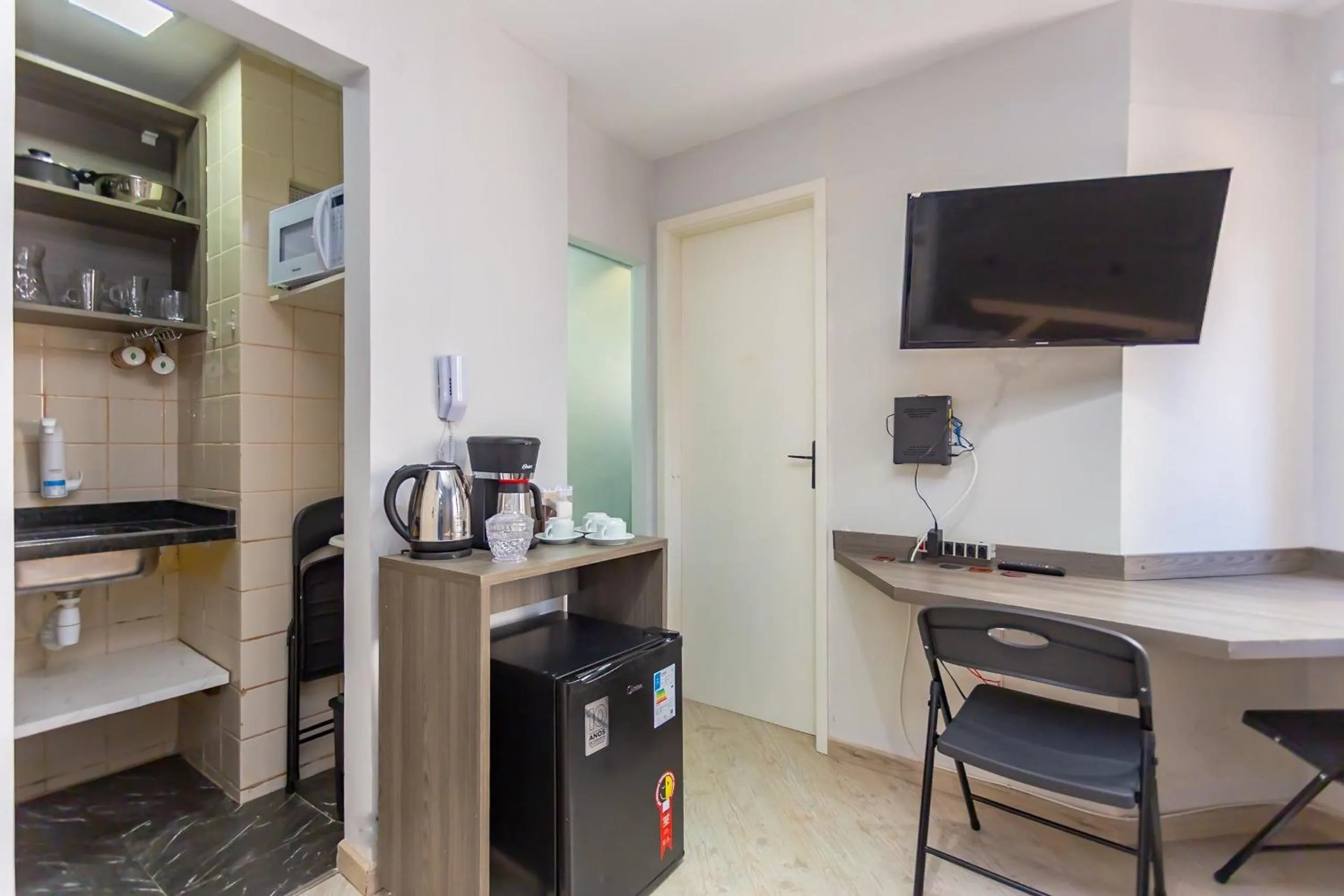 Kitchen or kitchenette in Ed. Charlie Chaplin | Prédio no coração de Curitiba | Gonzaga Stays