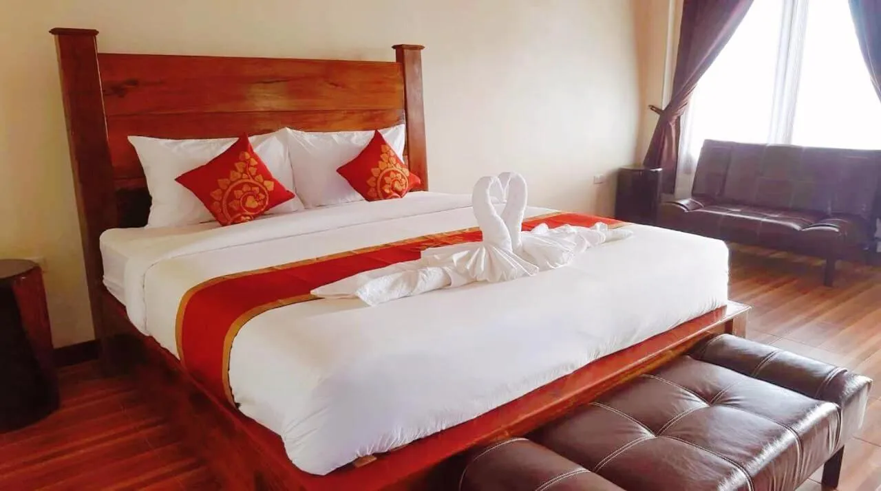 Bed in golden hotel dondet