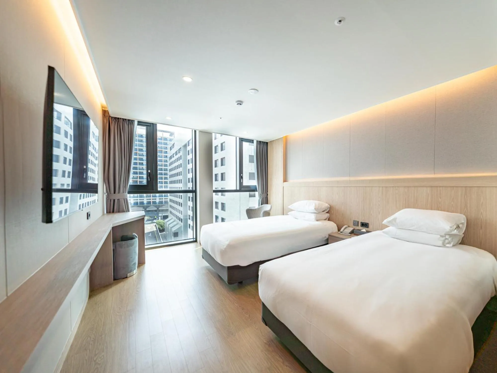 Bed in Jeju Bolton Hotel