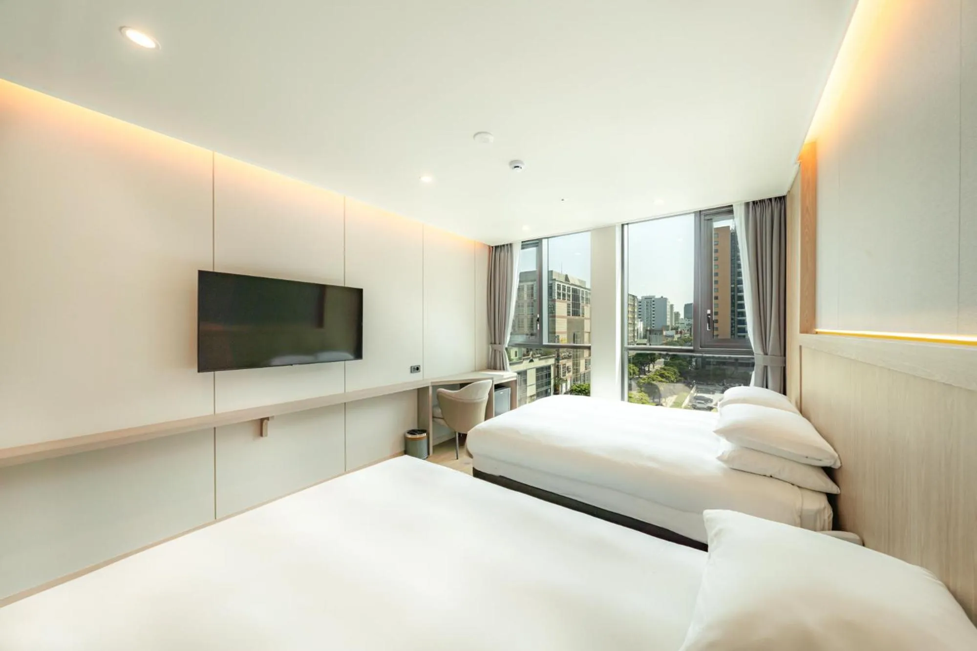 Bed in Jeju Bolton Hotel