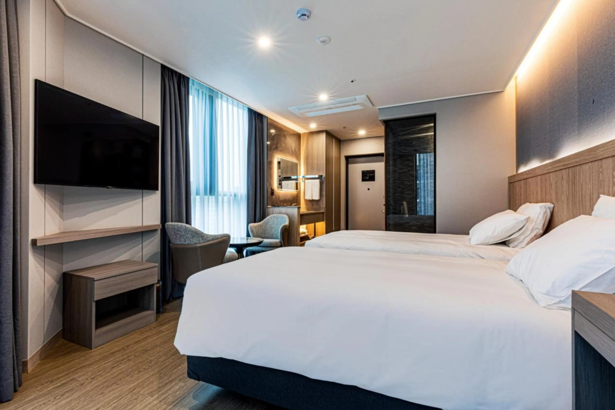 Bed in Jeju Bolton Hotel