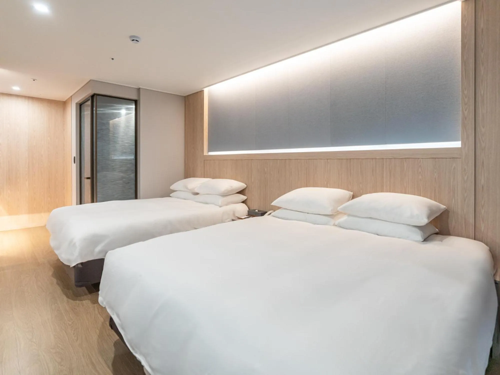 Bed in Jeju Bolton Hotel