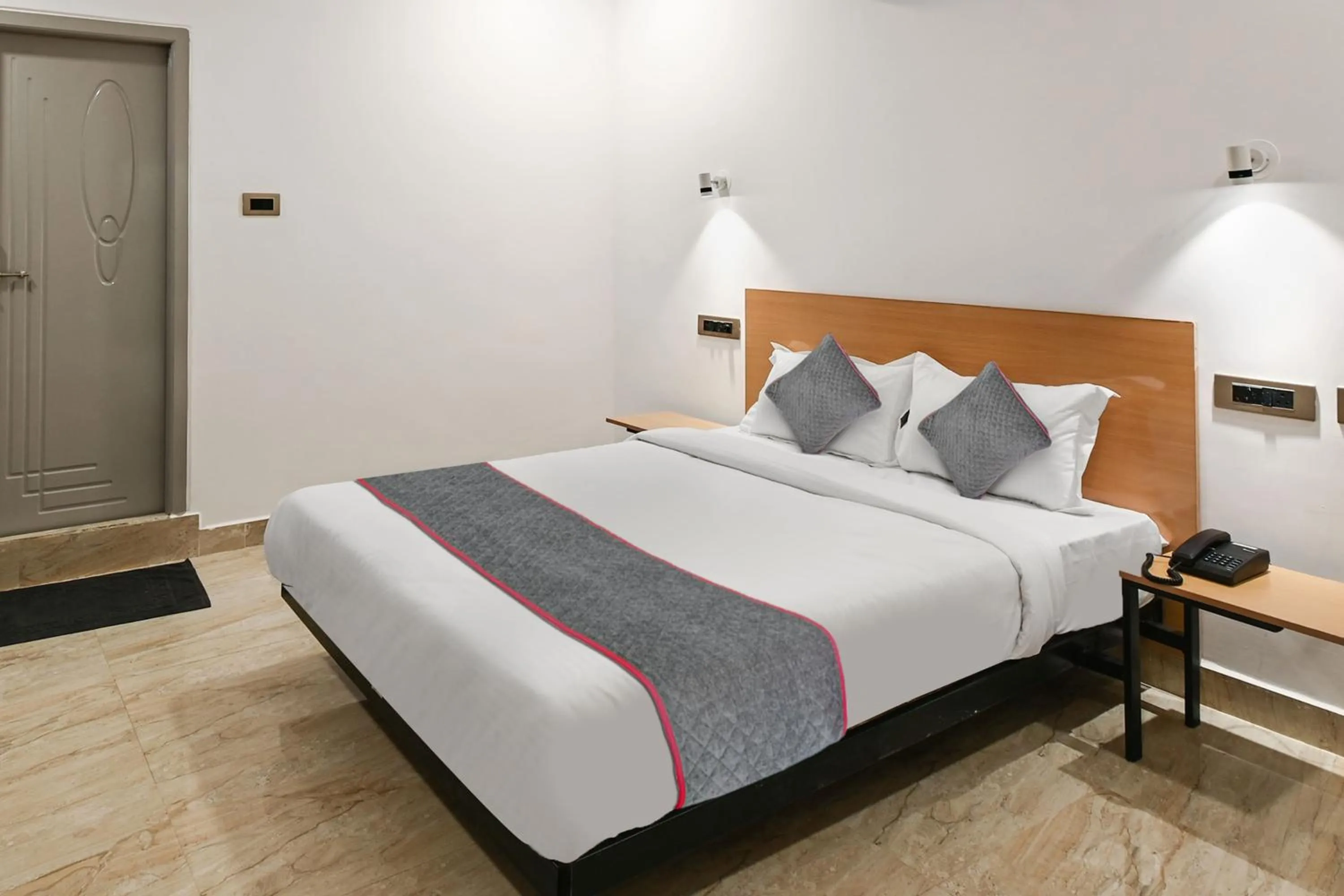 Bedroom in Super Townhouse De Alphabet Karmanghat