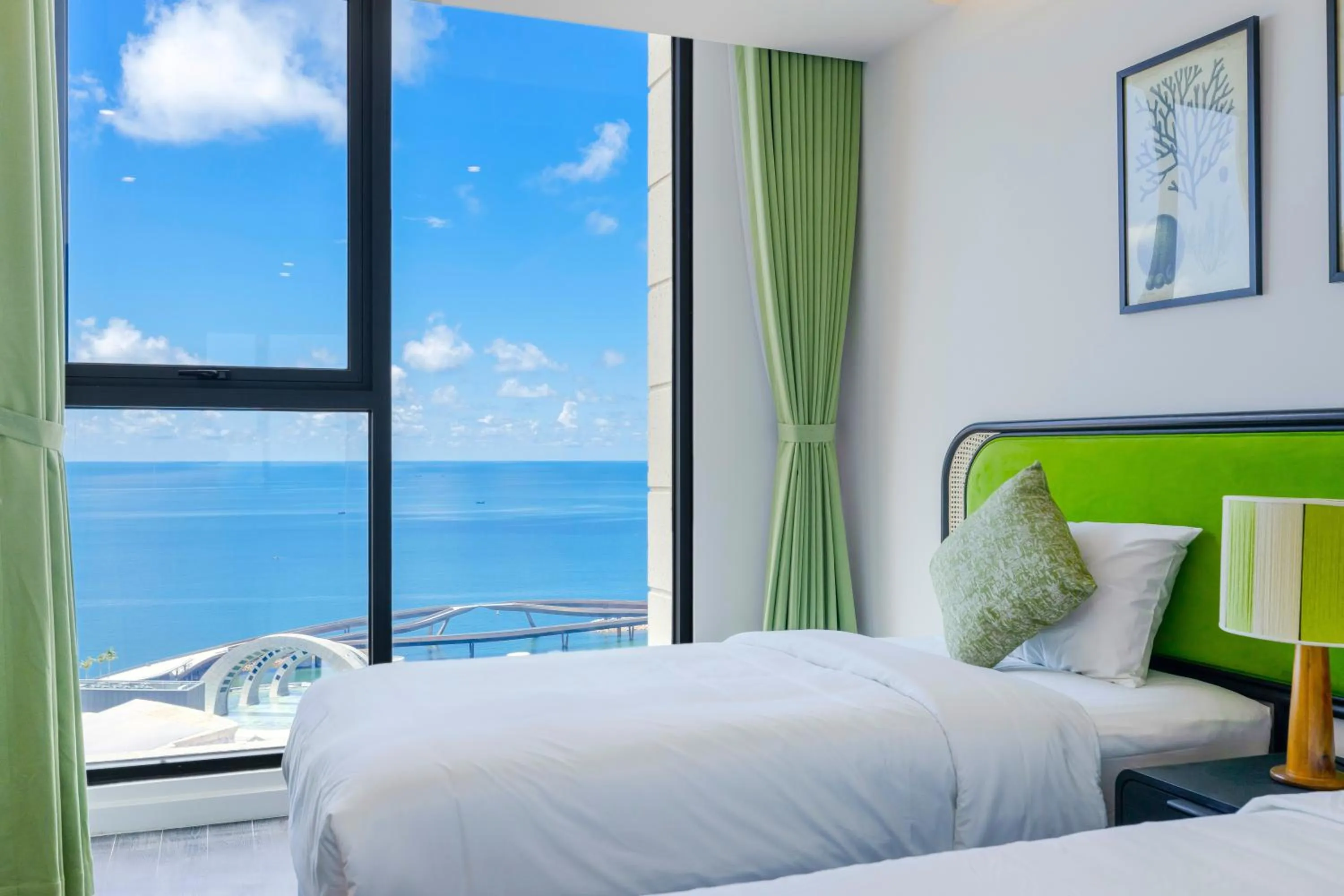 Bed in Rosie Hillside Seaview Phu Quoc Apartment