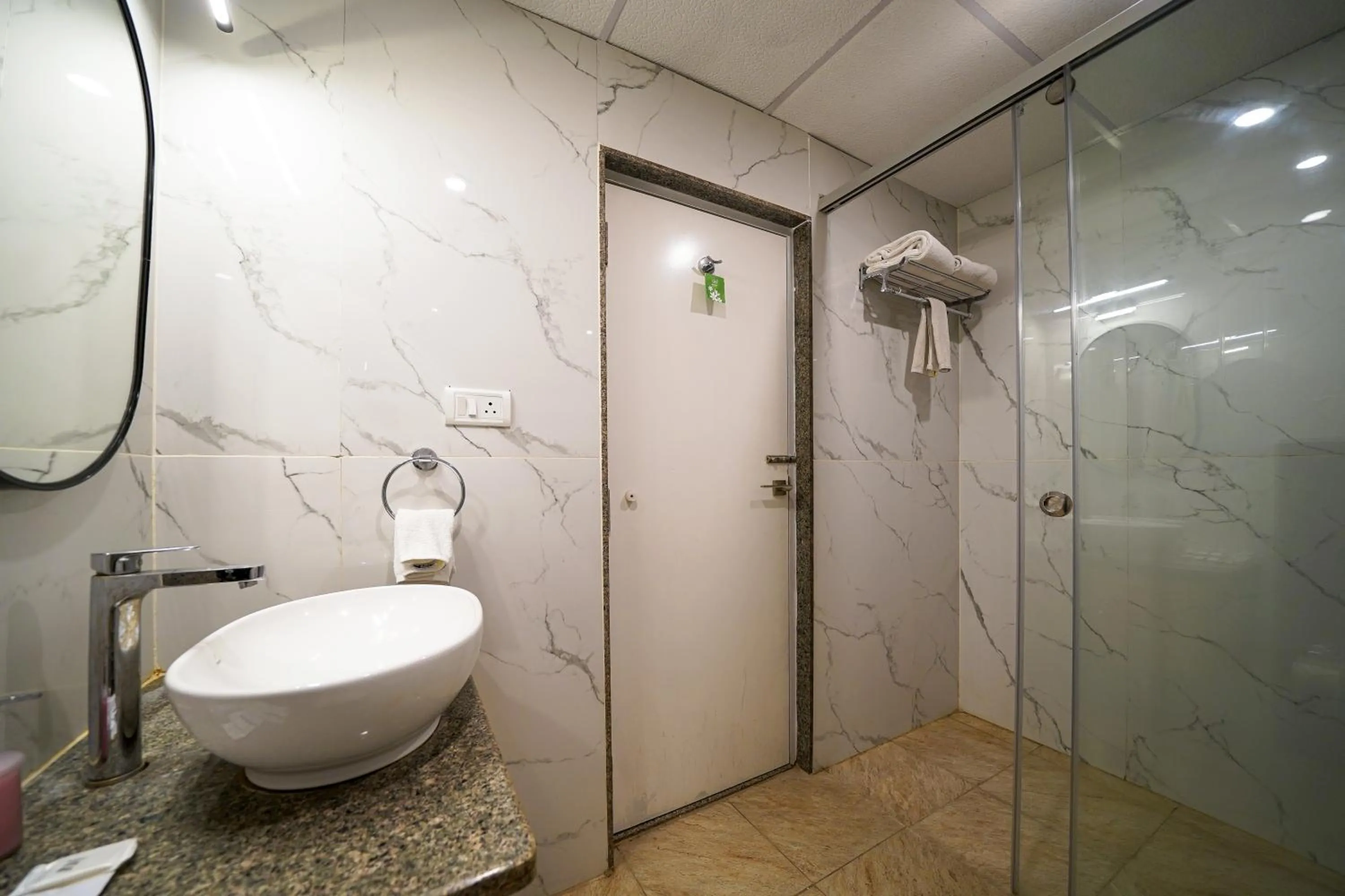 Bathroom in Olive Hotel Hebbal by Embassy Group