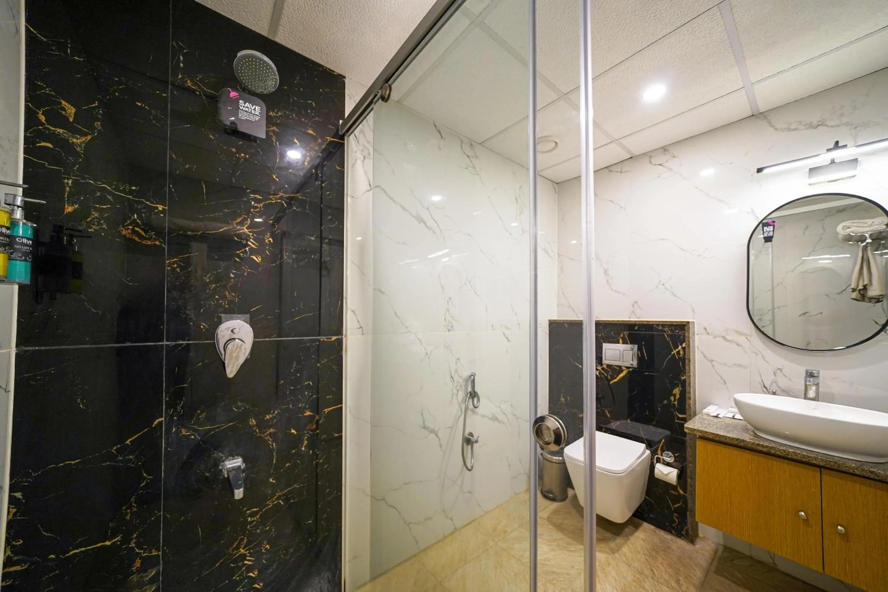 Bathroom in Olive Hotel Hebbal by Embassy Group