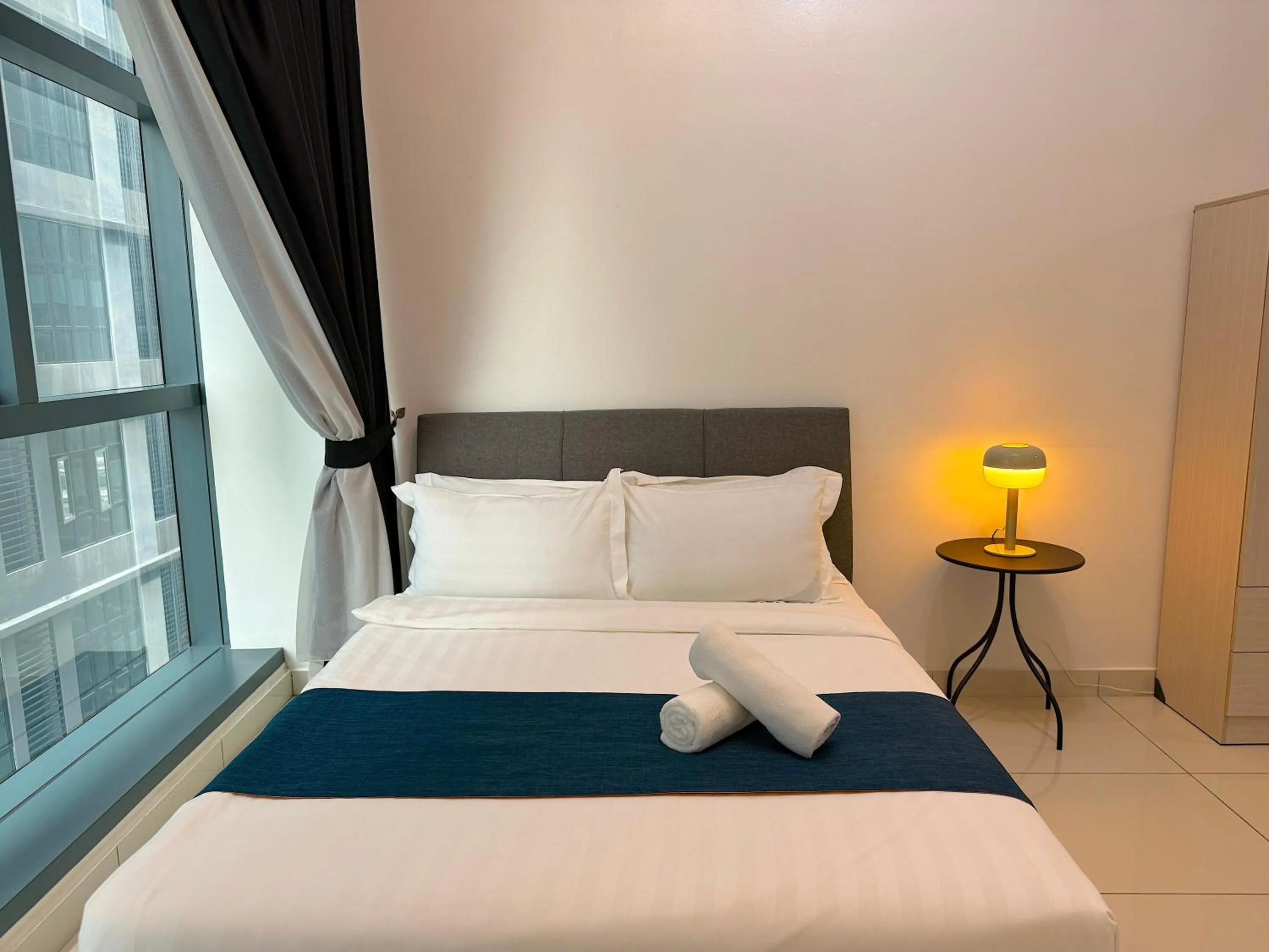 Bed in 3 Towers Jalan Ampang By Serenity Vacation Homes