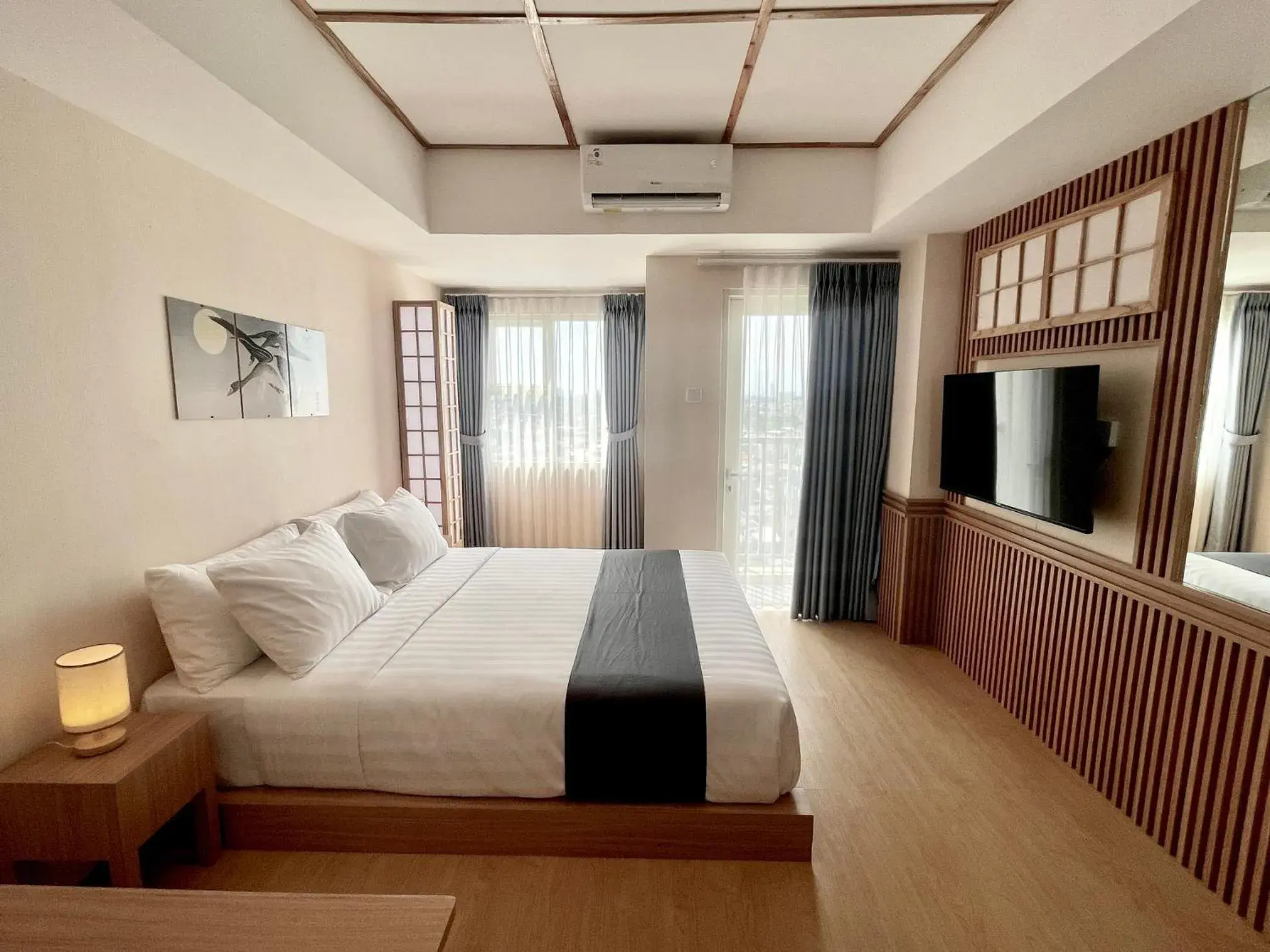 TV and multimedia, Bed in Nemuru Hotel Ciputat TV and multimedia, Bed in Nemuru Hotel Ciputat