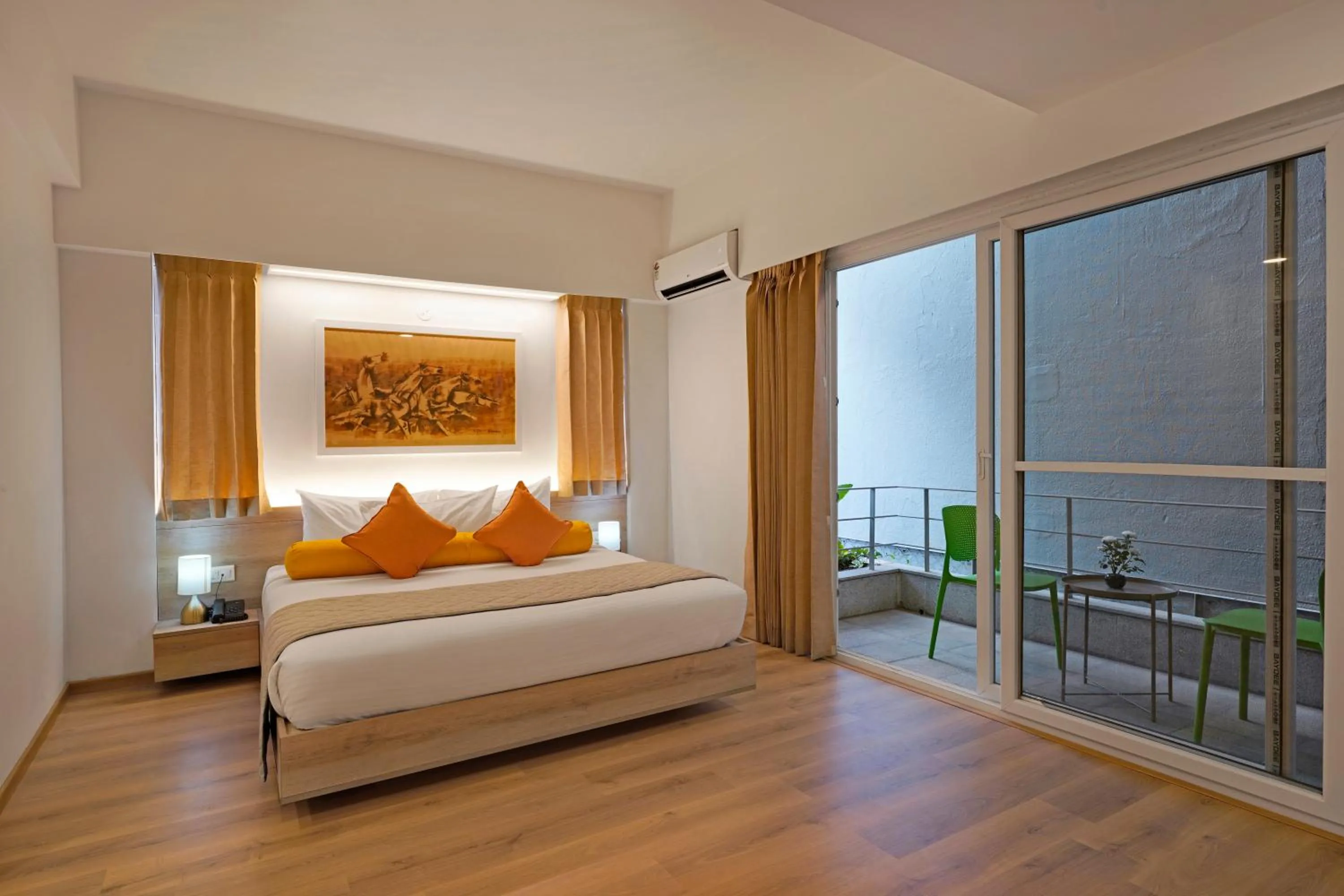 Seating area, Bed in Nest By Rivido Apart Hotel, Bannerghatta road